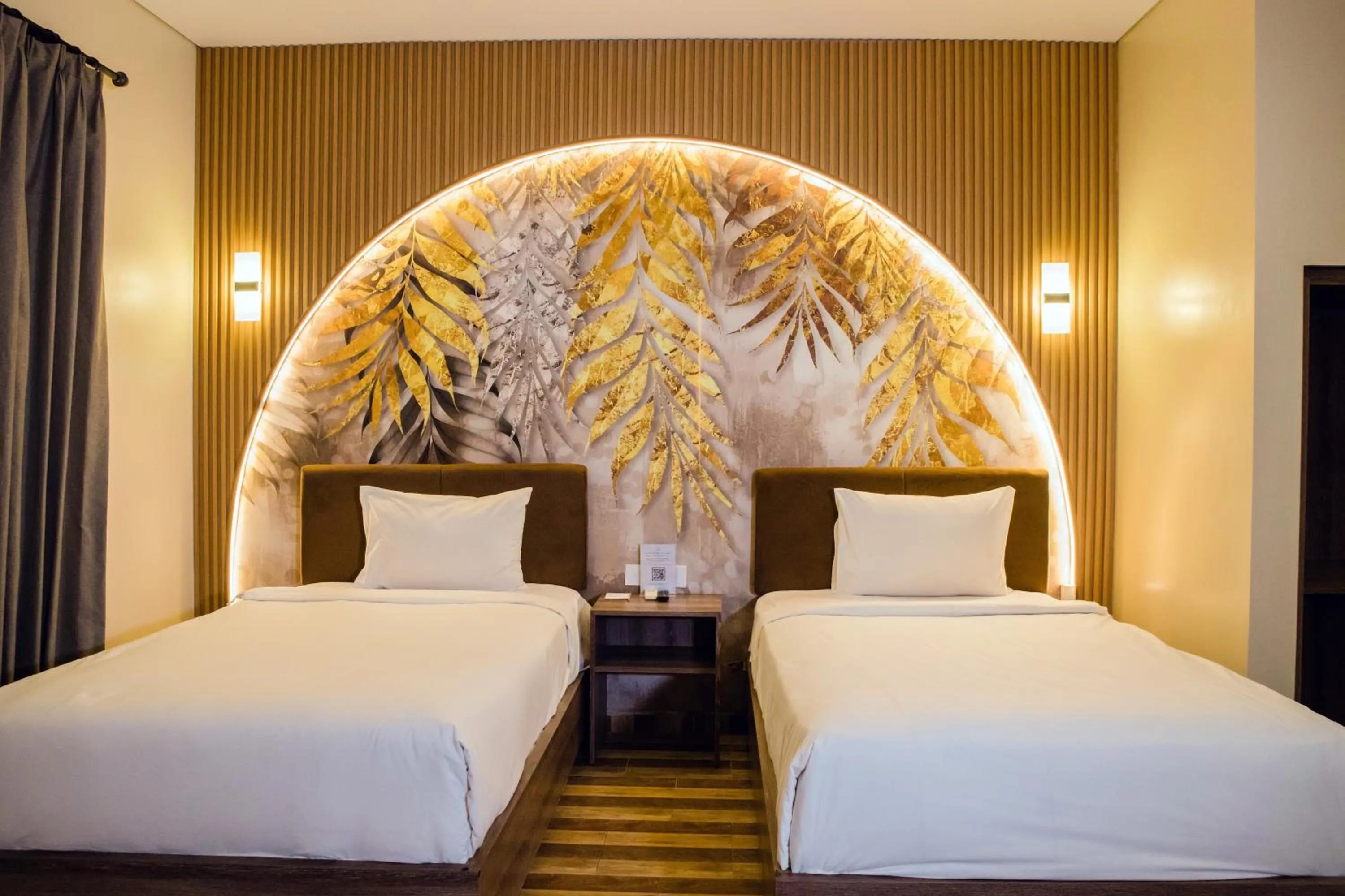 Bed in Grand Kesambi Resort and Villas Seminyak