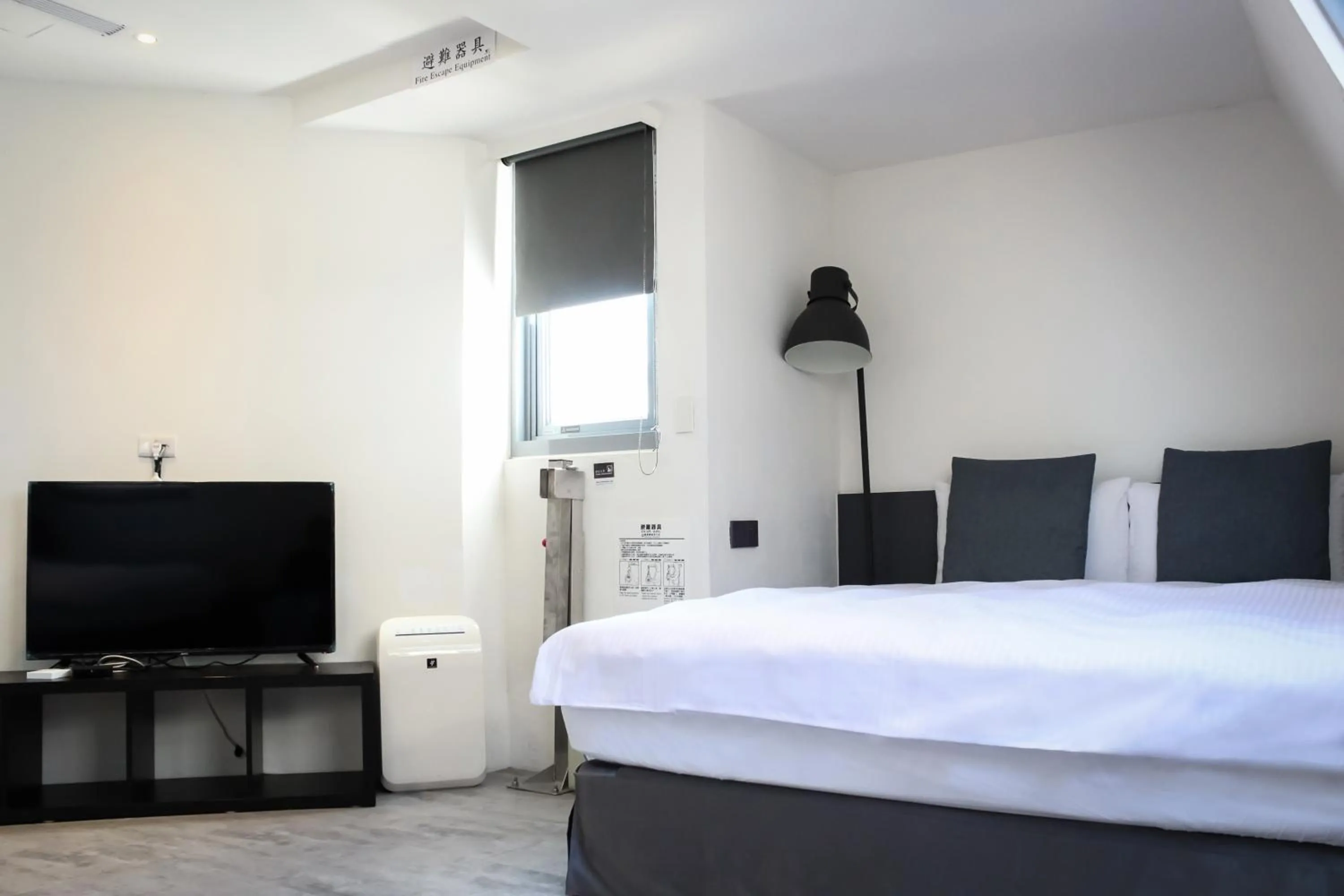 Bed in CHECK inn Taichung Liming