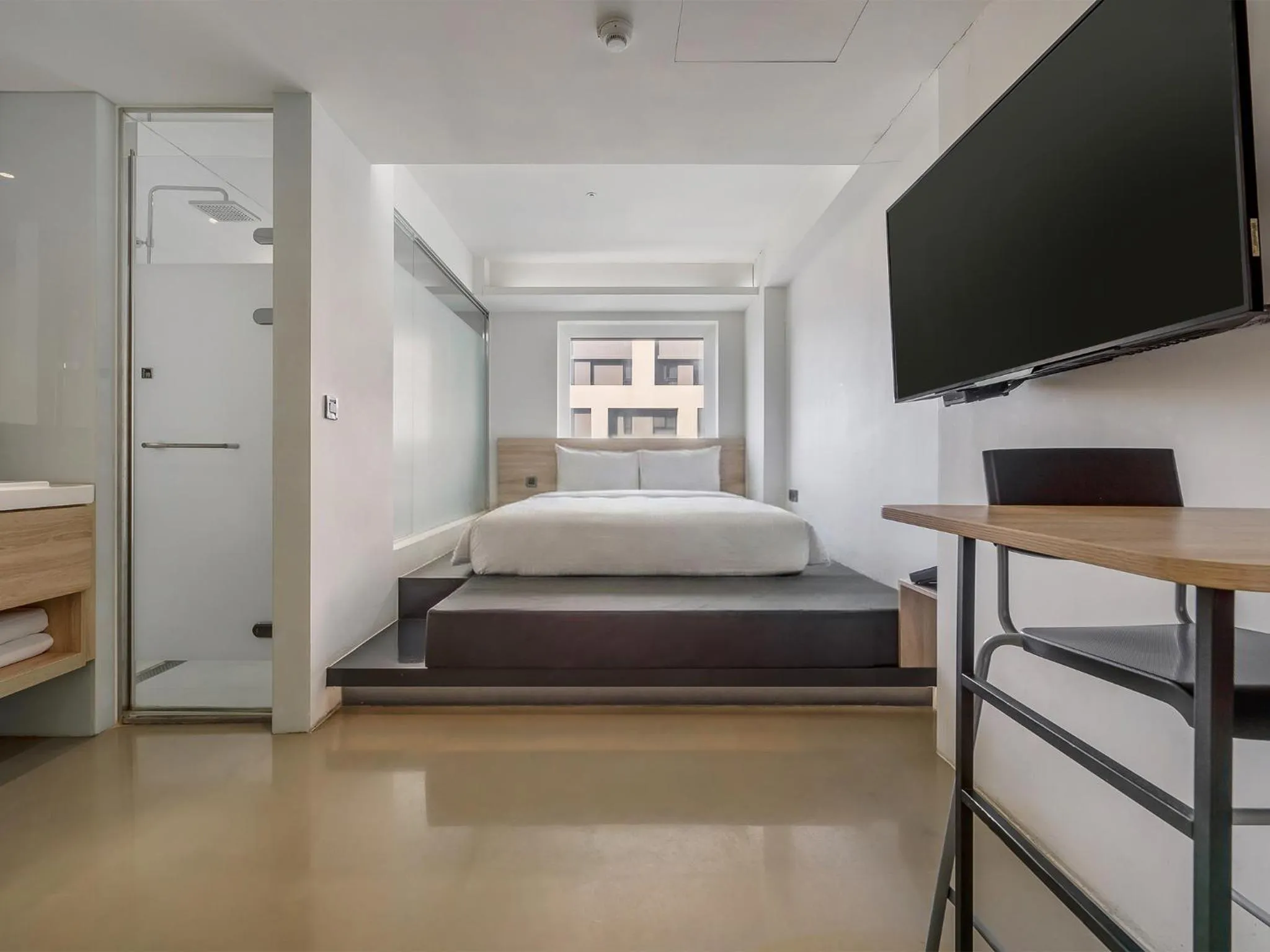 Bed in CHECK inn Taichung Liming