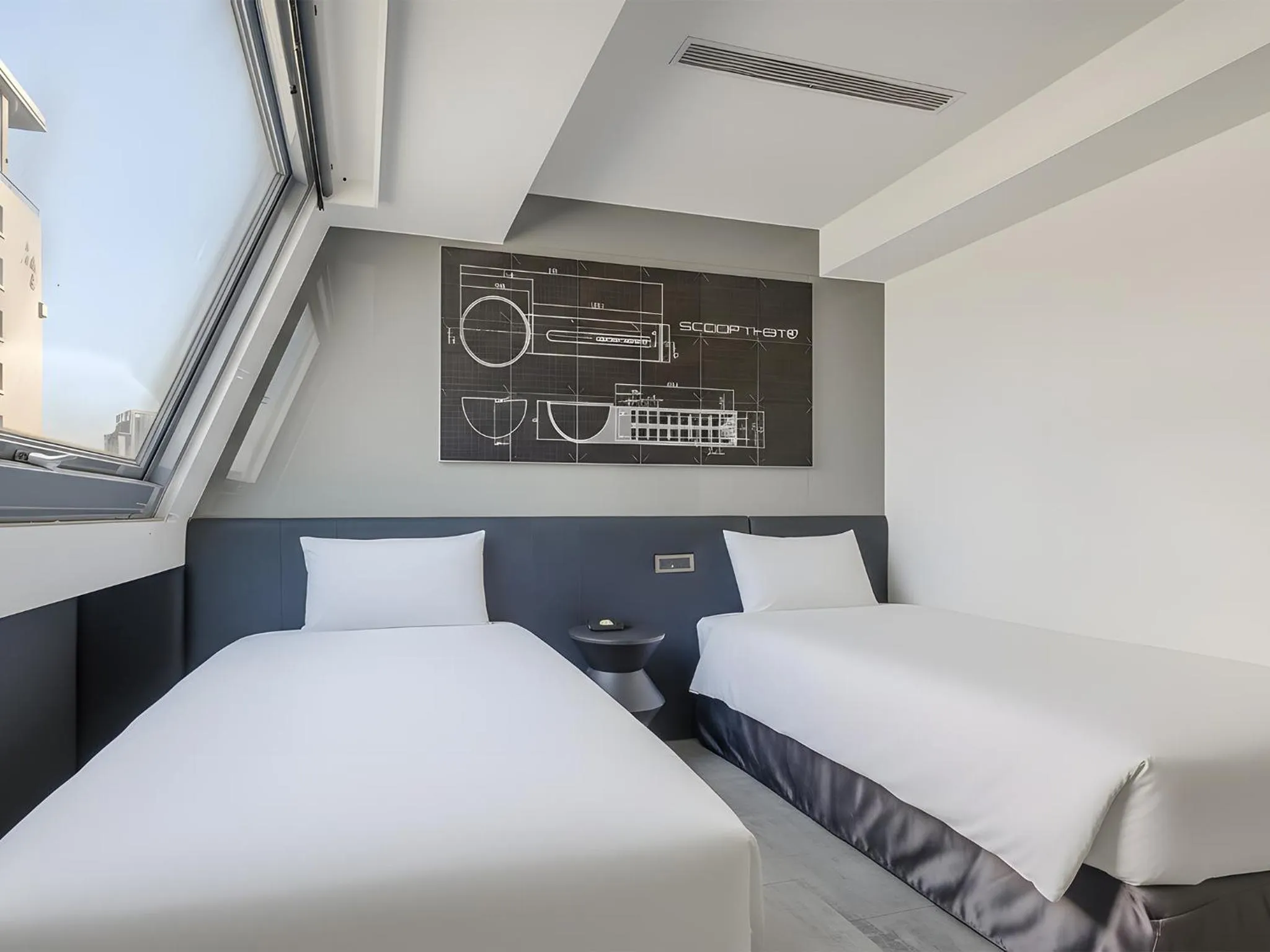 Bed in CHECK inn Taichung Liming