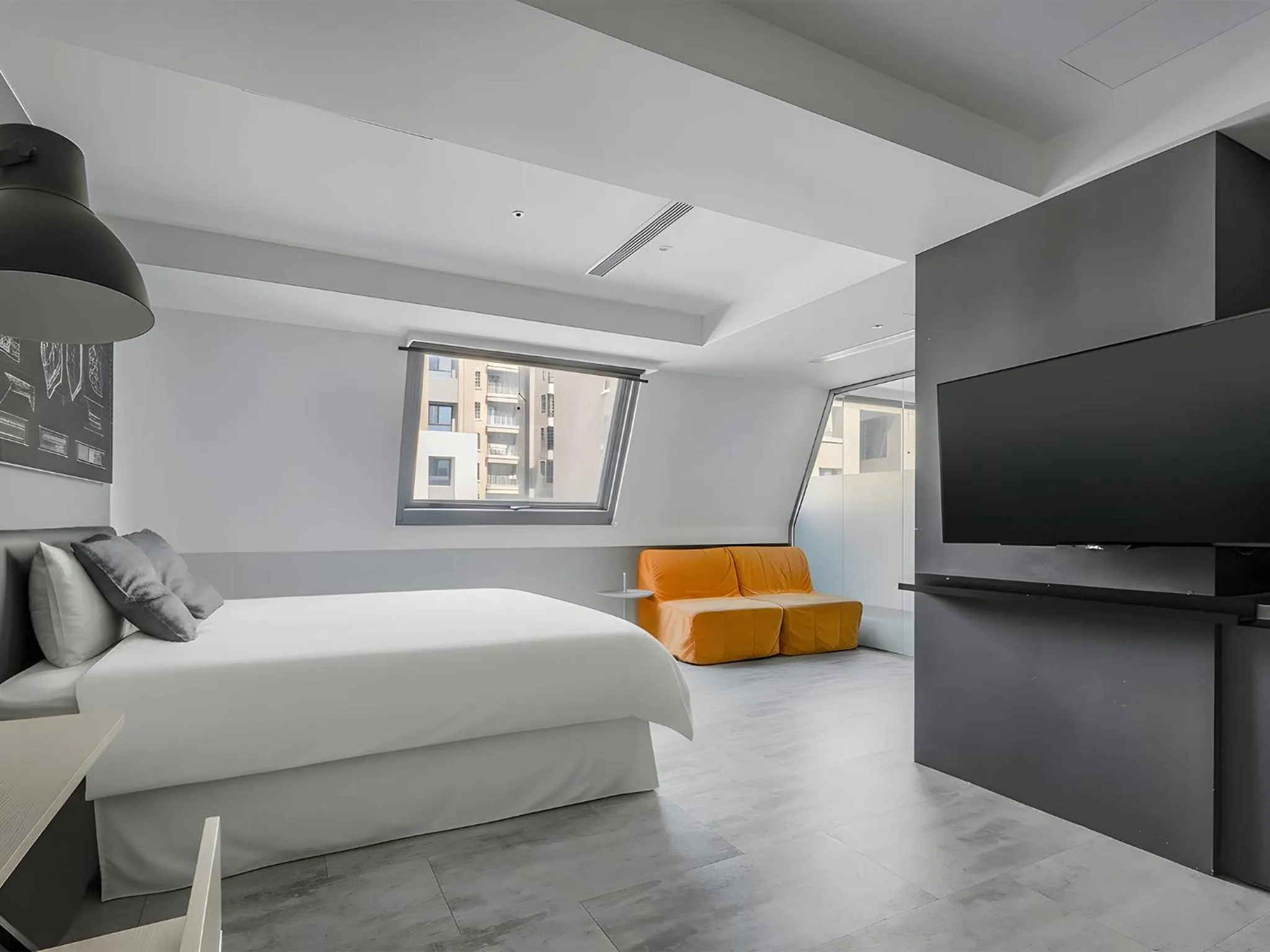 Bed in CHECK inn Taichung Liming