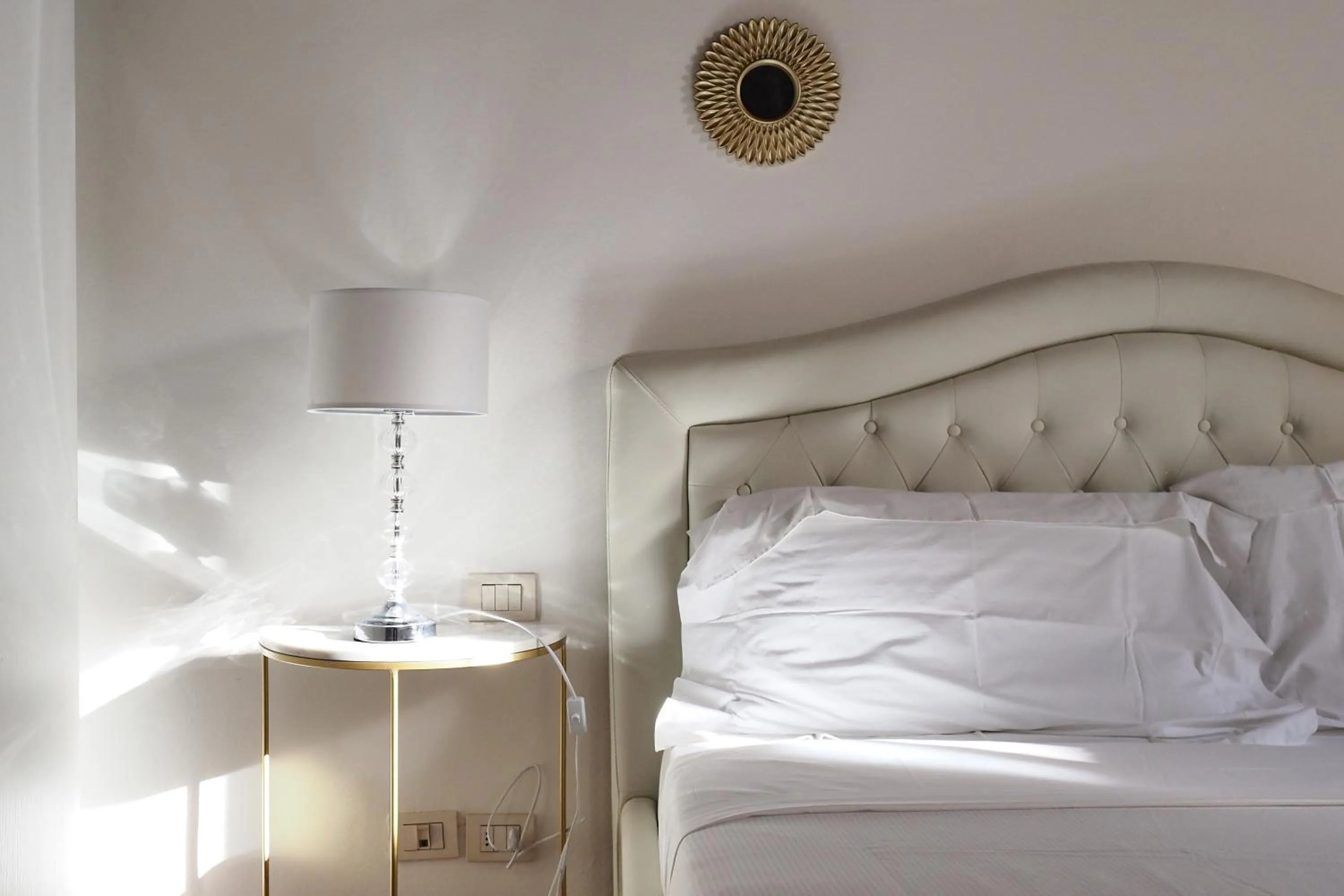 Decorative detail, Bed in Mila Apartments Magenta