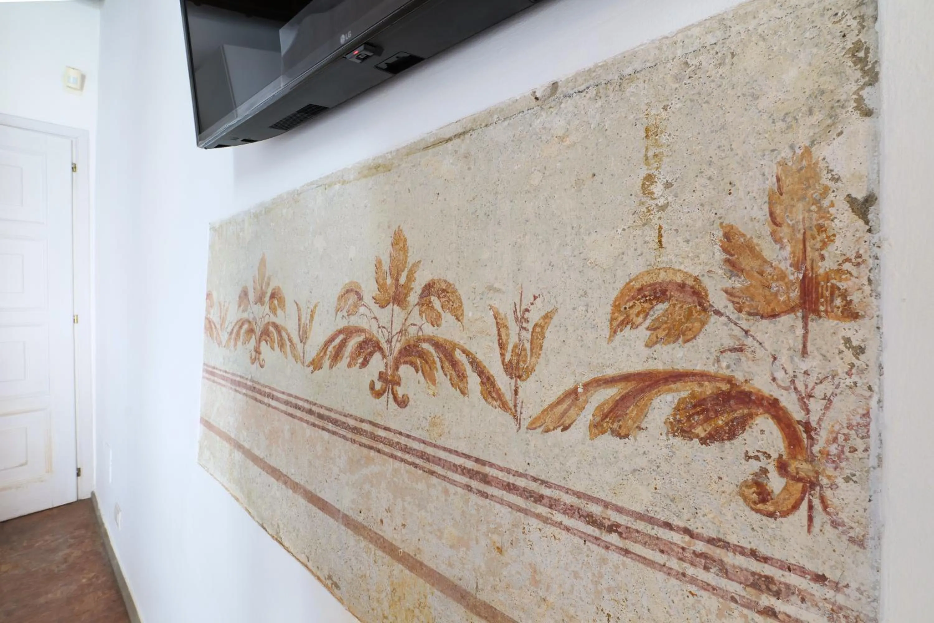 Decorative detail in Mila Apartments Magenta