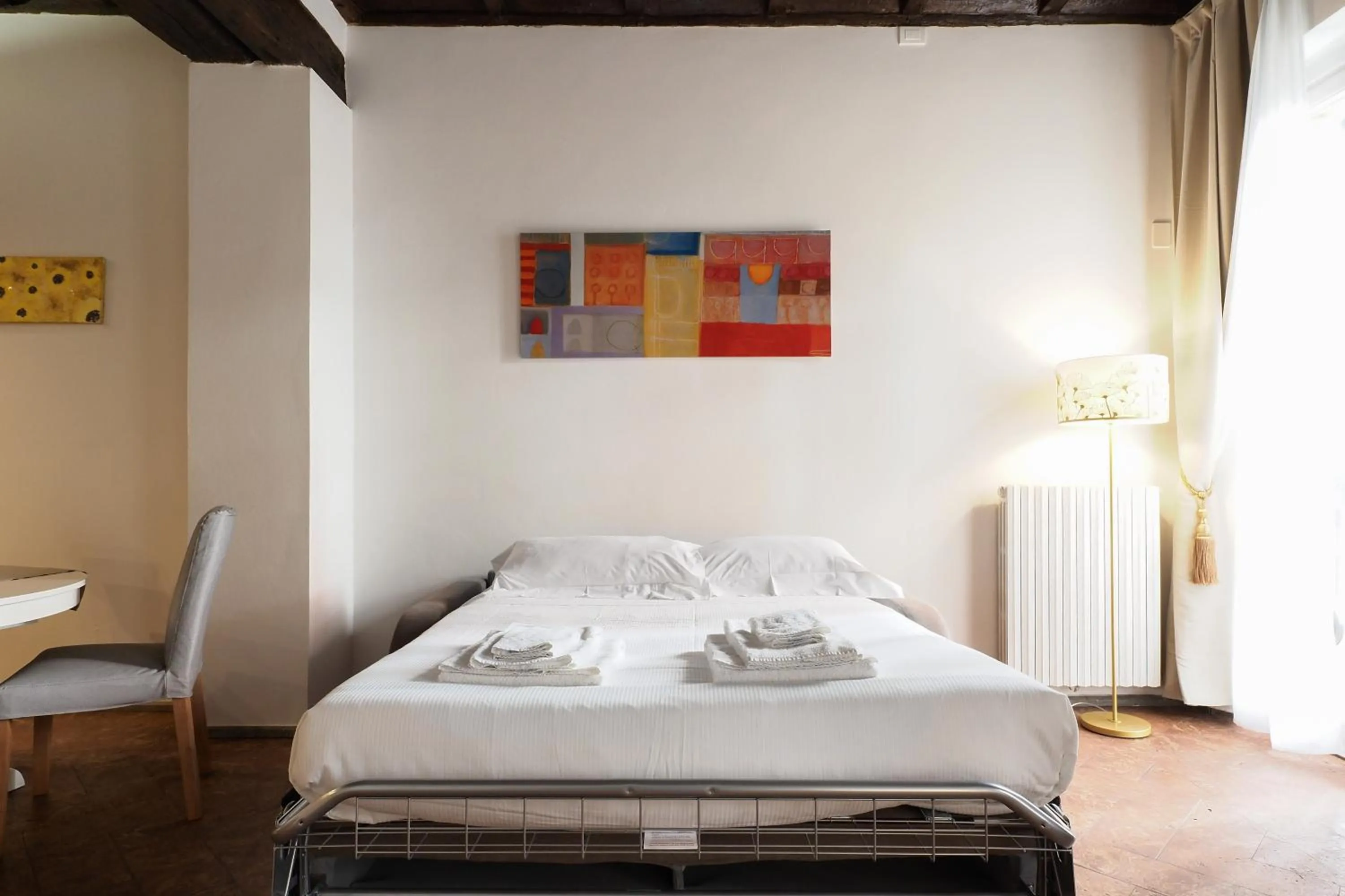 Bed in Mila Apartments Magenta