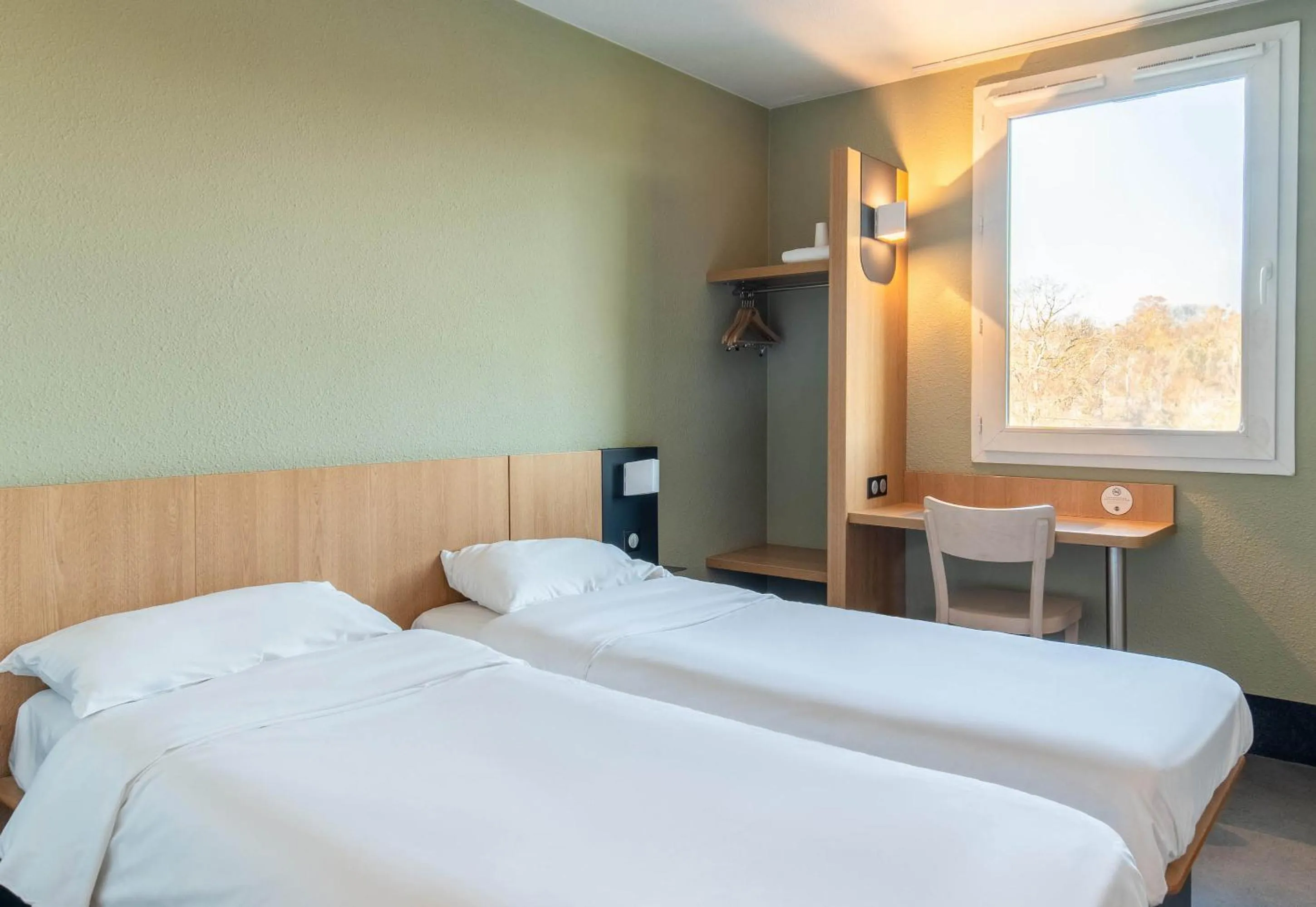 Bedroom, Bed in B&B HOTEL Brive-la-Gaillarde