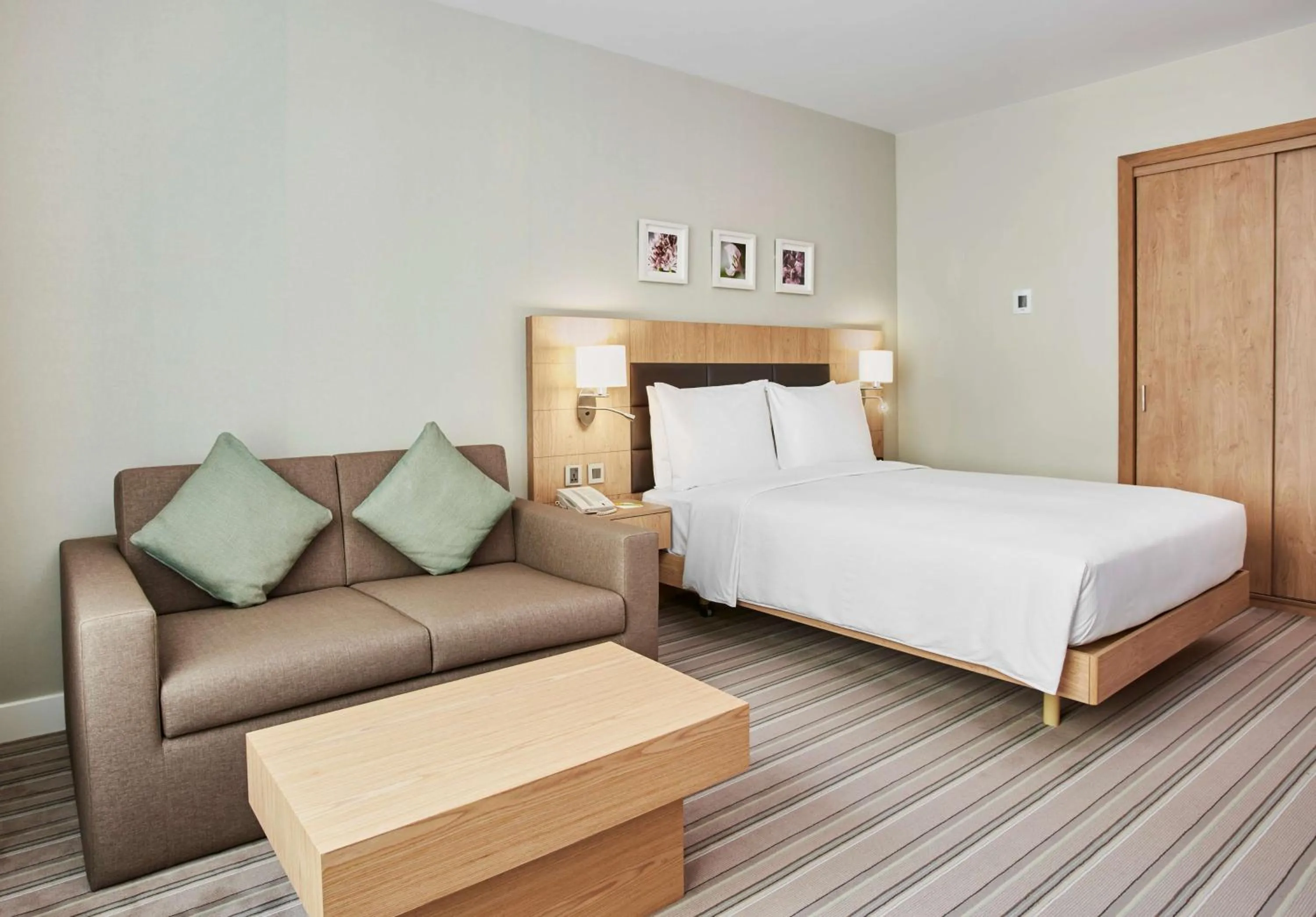 Living room, Bed in Hilton Garden Inn Dubai, Mall Avenue