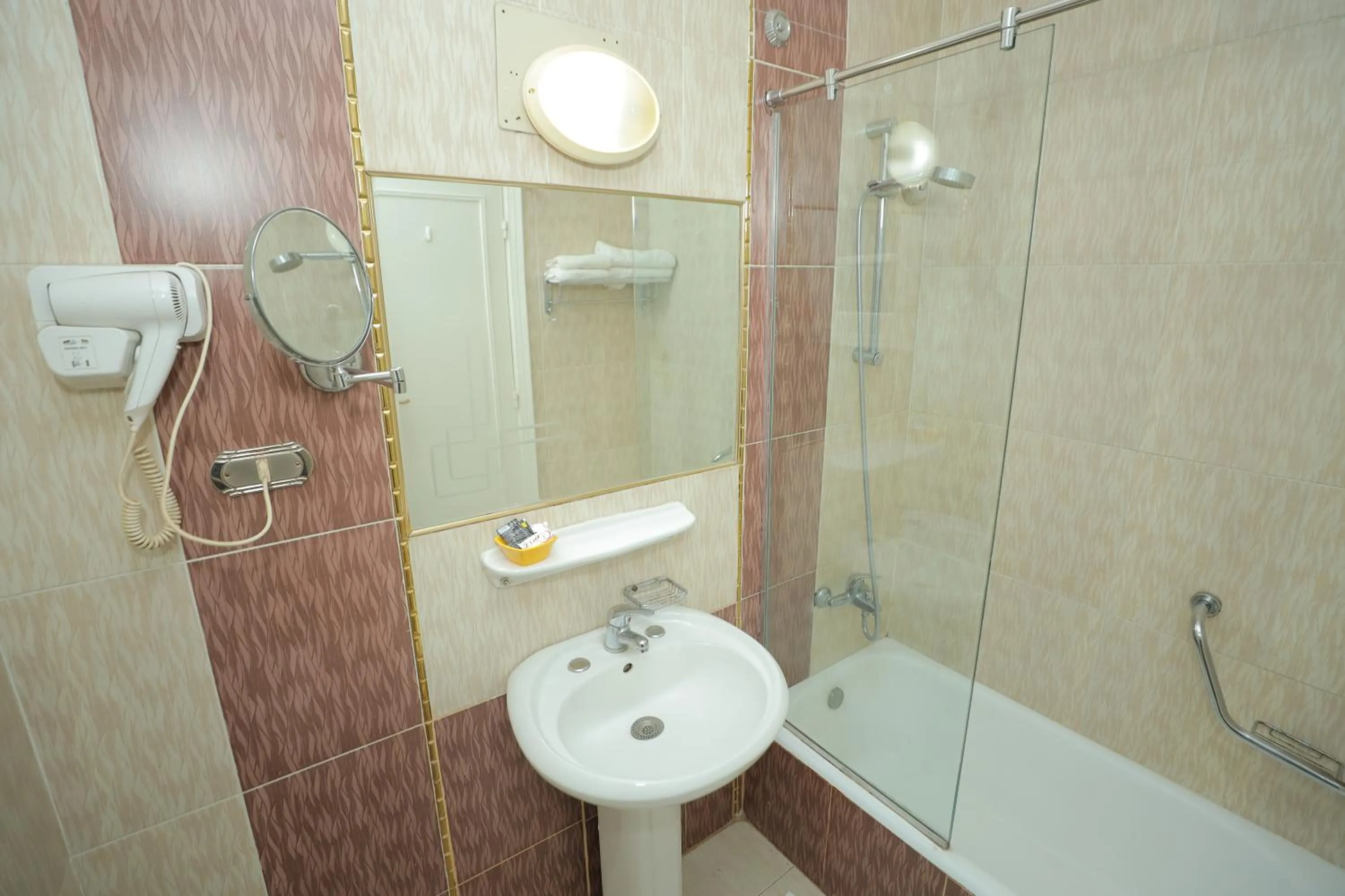 Bathroom in Happy City Hotel