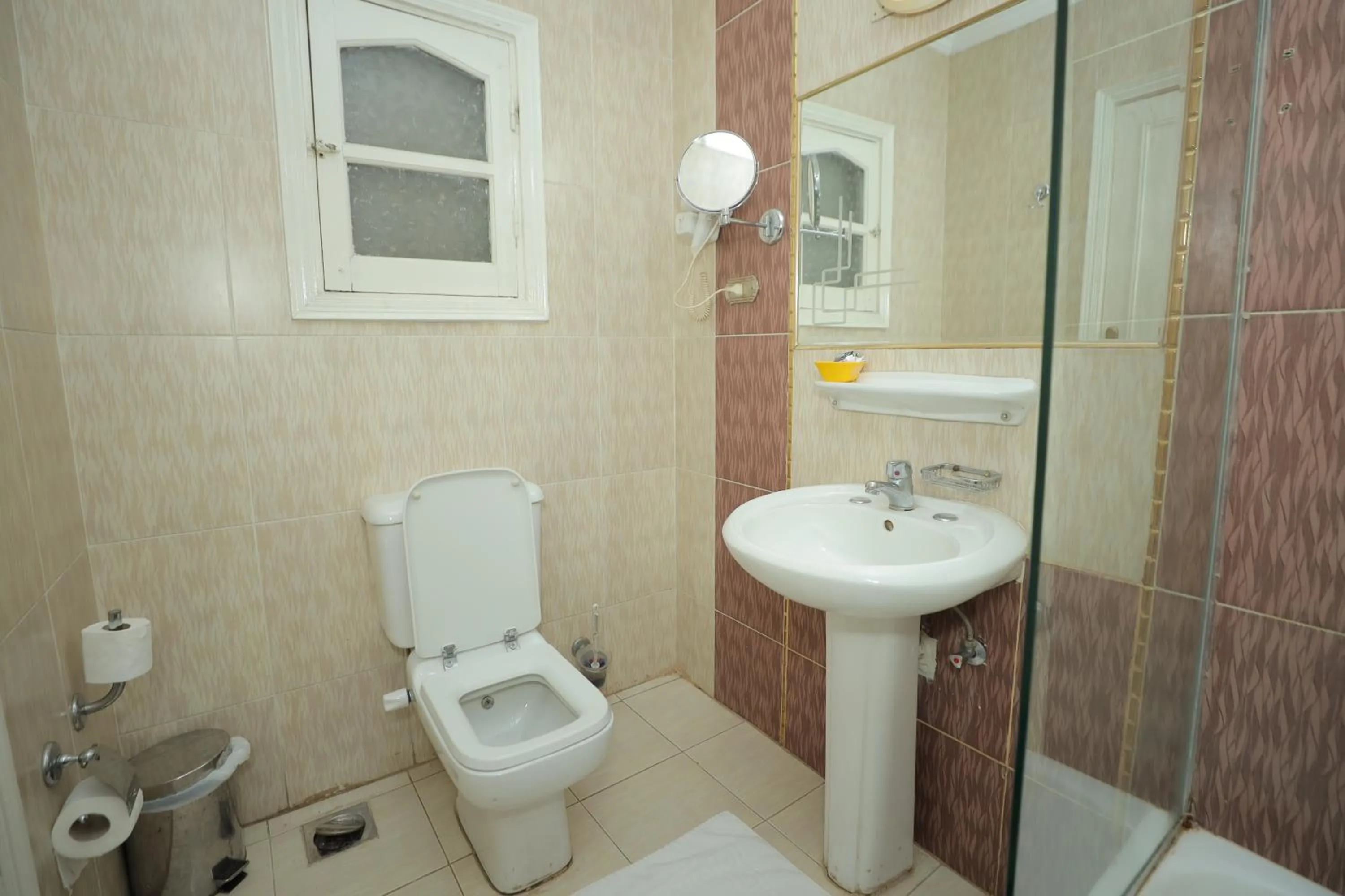 Bed in Happy City Hotel