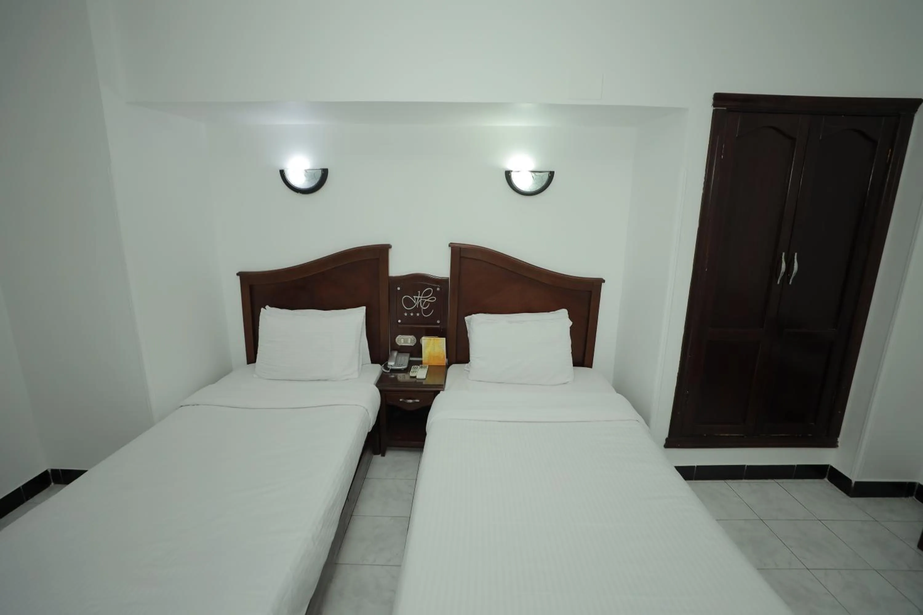 Photo of the whole room, Bed in Happy City Hotel