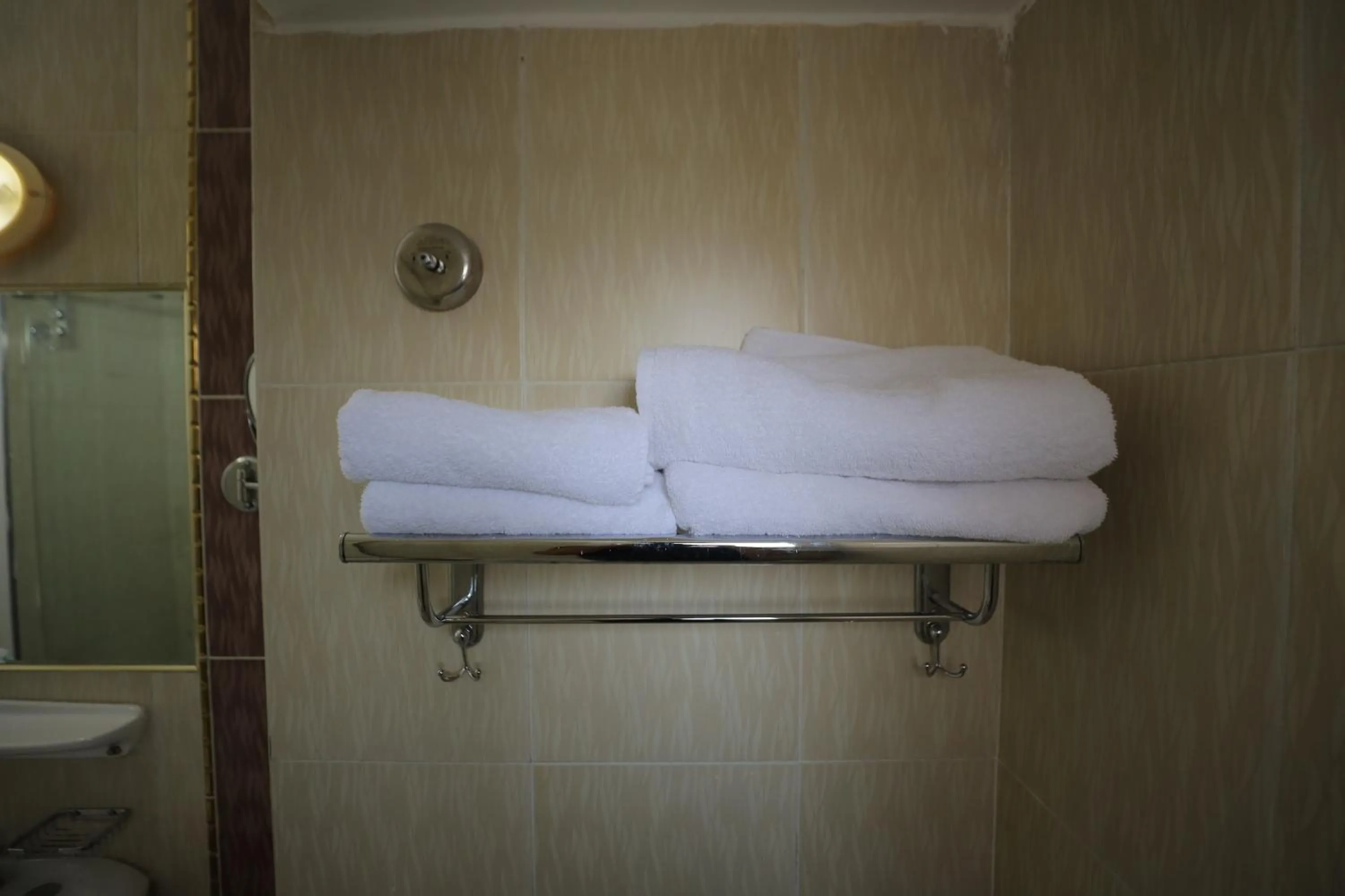 Bathroom in Happy City Hotel