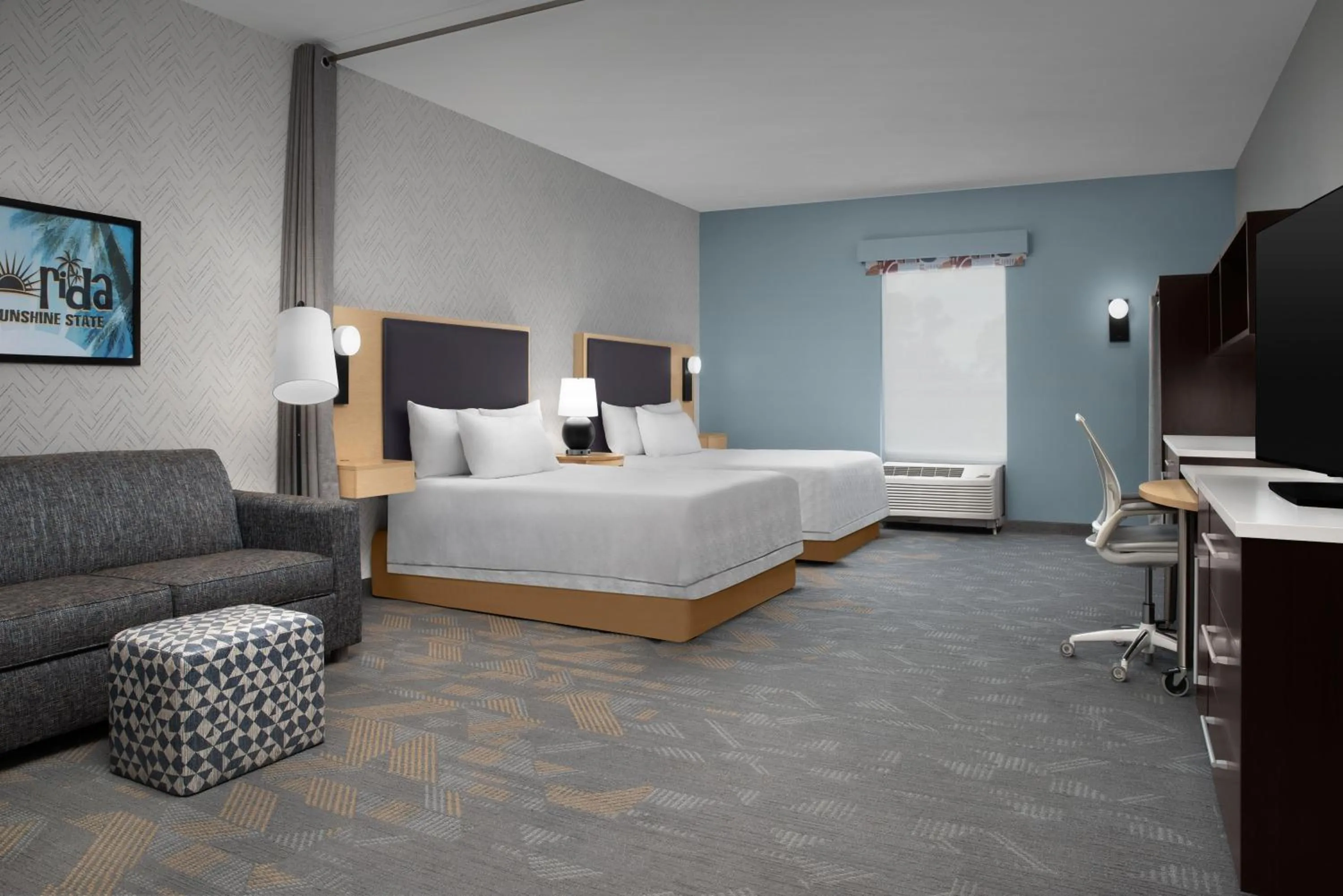 Living room, Bed in Home2 Suites by Hilton Lake City