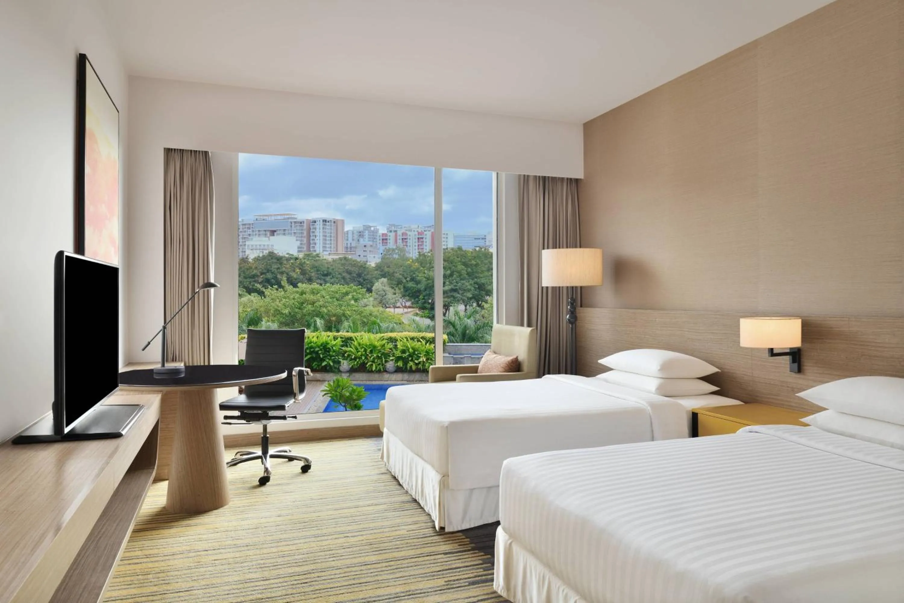 Photo of the whole room, Bed in Courtyard by Marriott Bengaluru Outer Ring Road