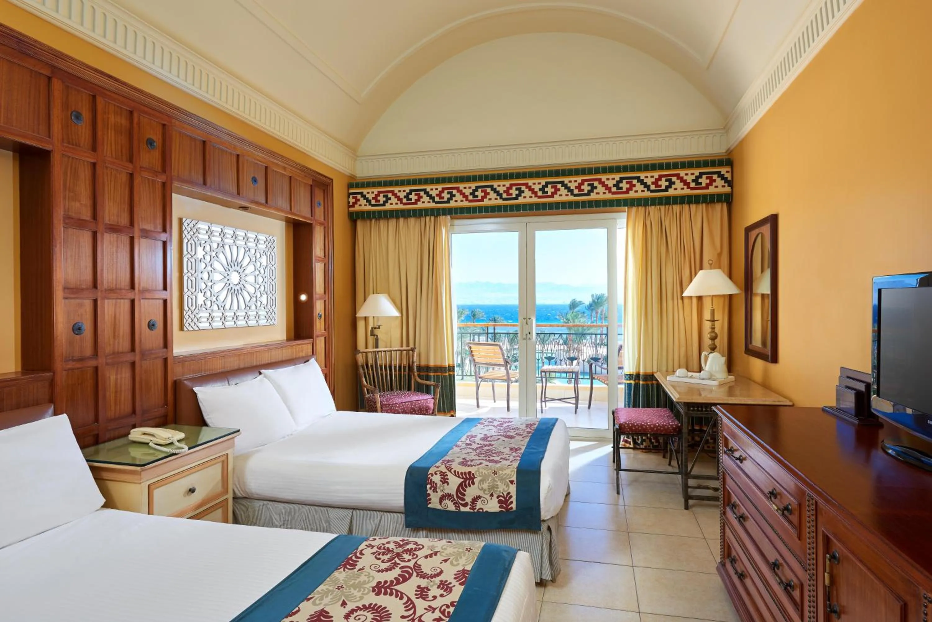 Bed in Mosaique Beach Resort Taba Heights