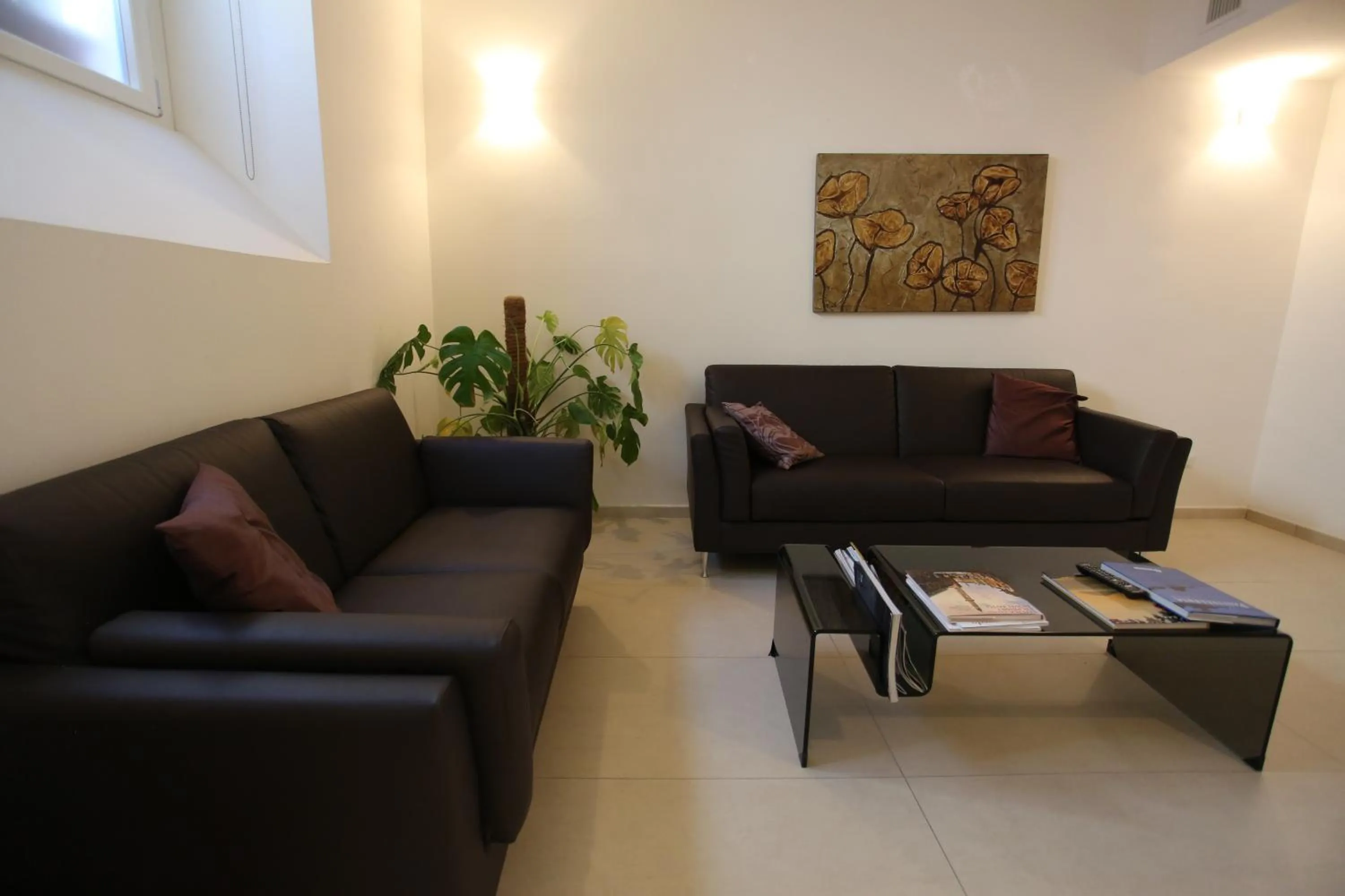 Communal lounge/ TV room in Hotel Eubea