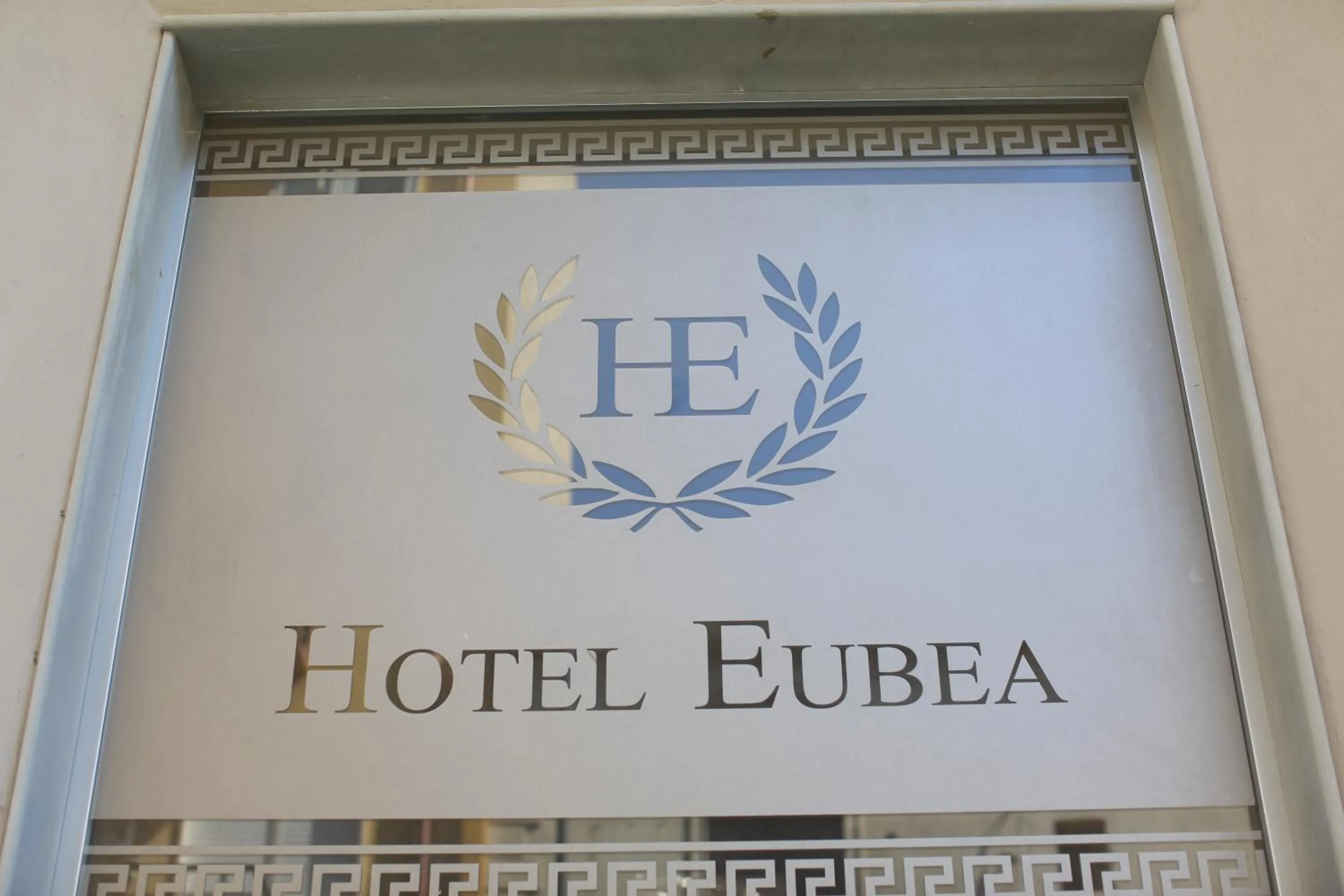 Property logo or sign in Hotel Eubea
