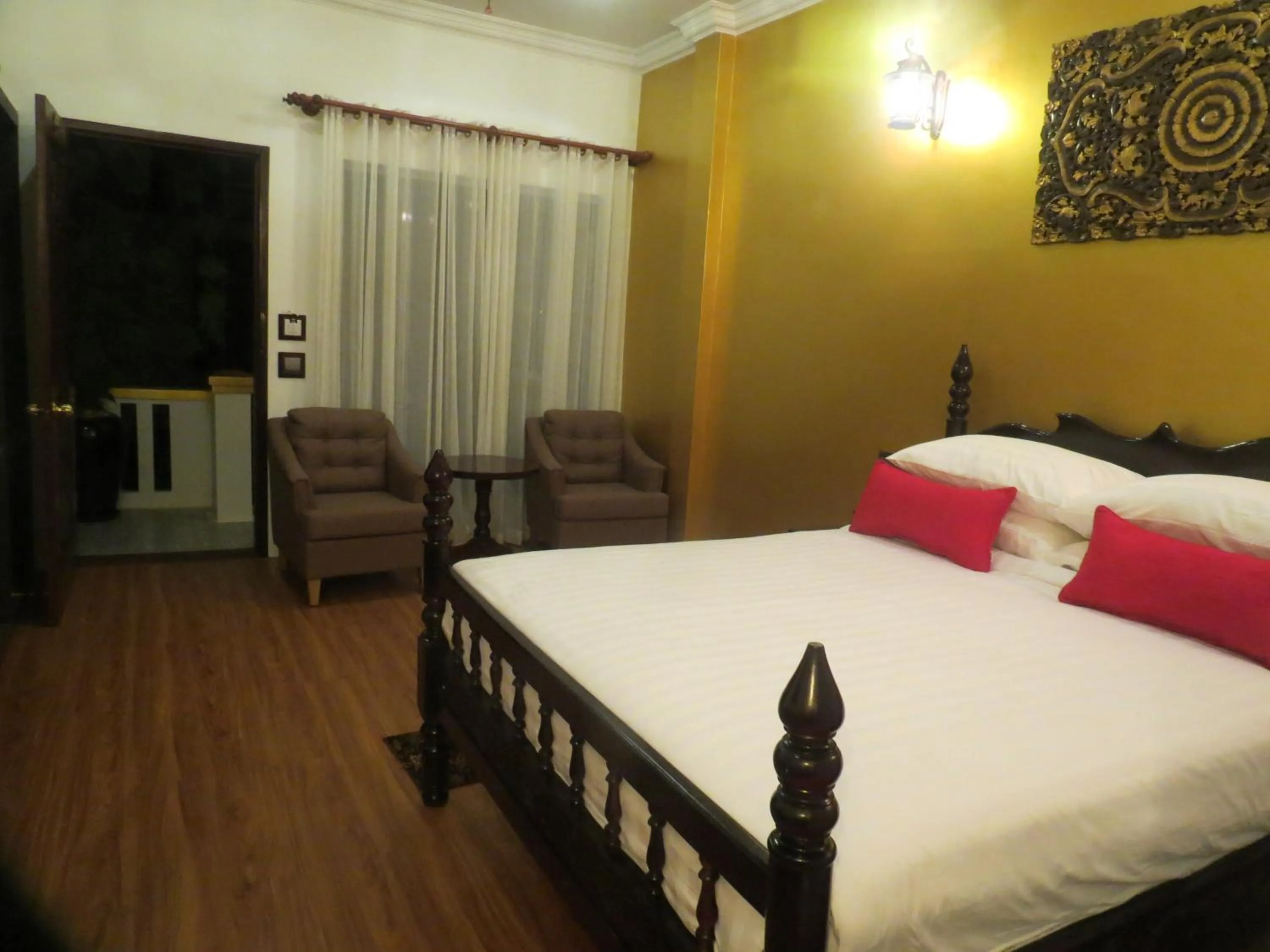 View (from property/room), Bed in Beyond Yangon Inn