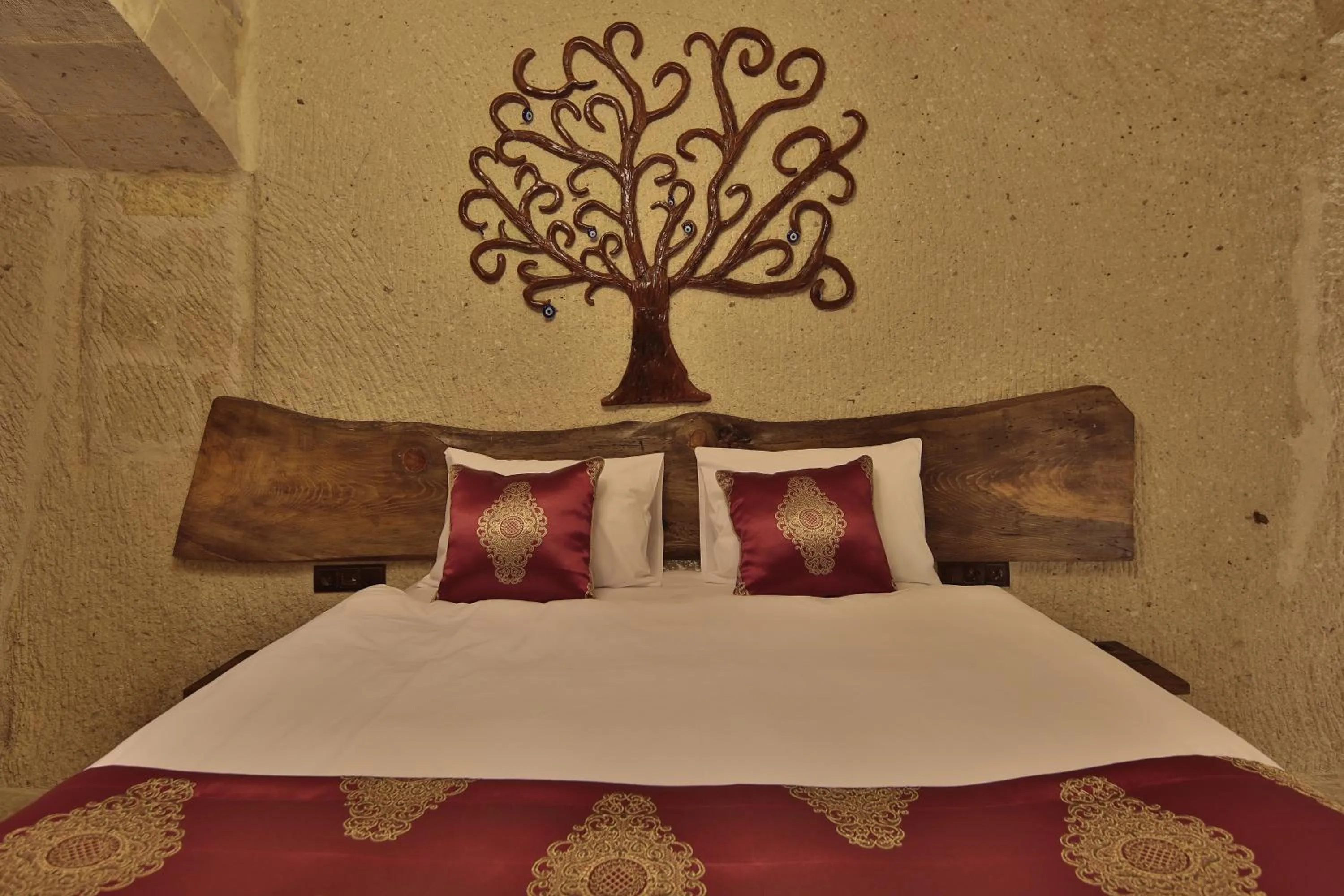 Bed in Aren Cave Hotel And Art Gallery