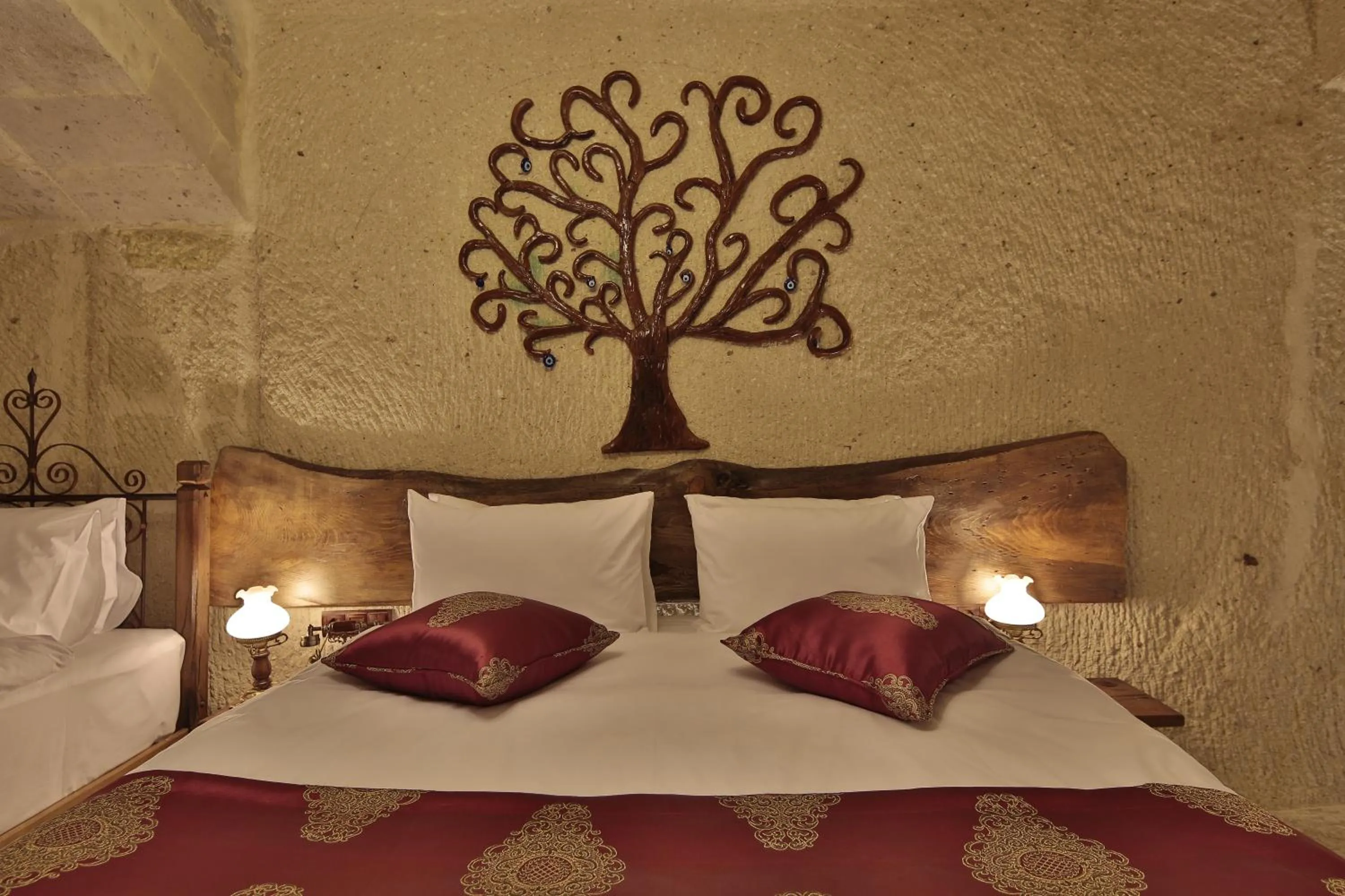 Bed in Aren Cave Hotel And Art Gallery