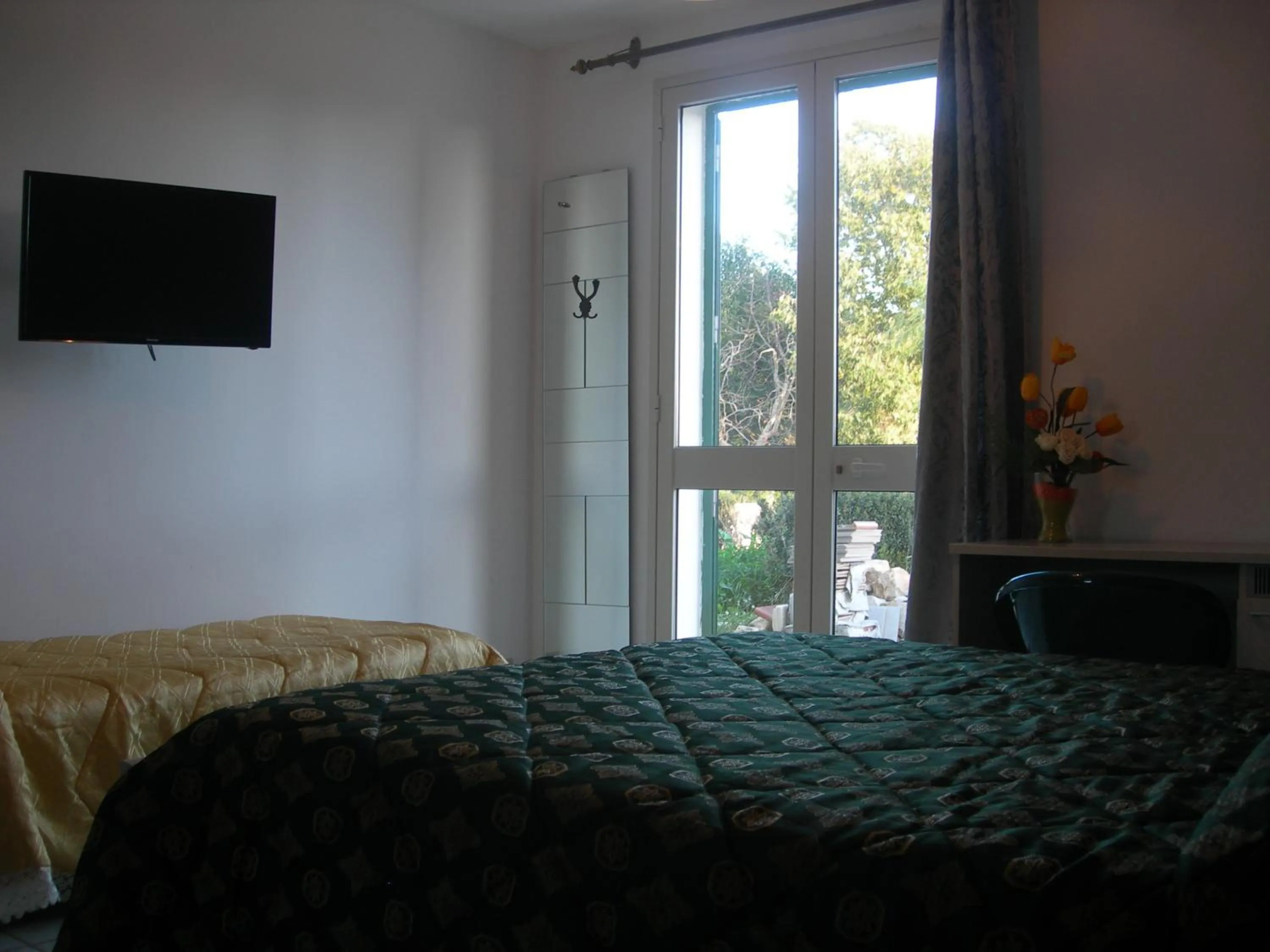 Photo of the whole room, Bed in Modica Garden Resort