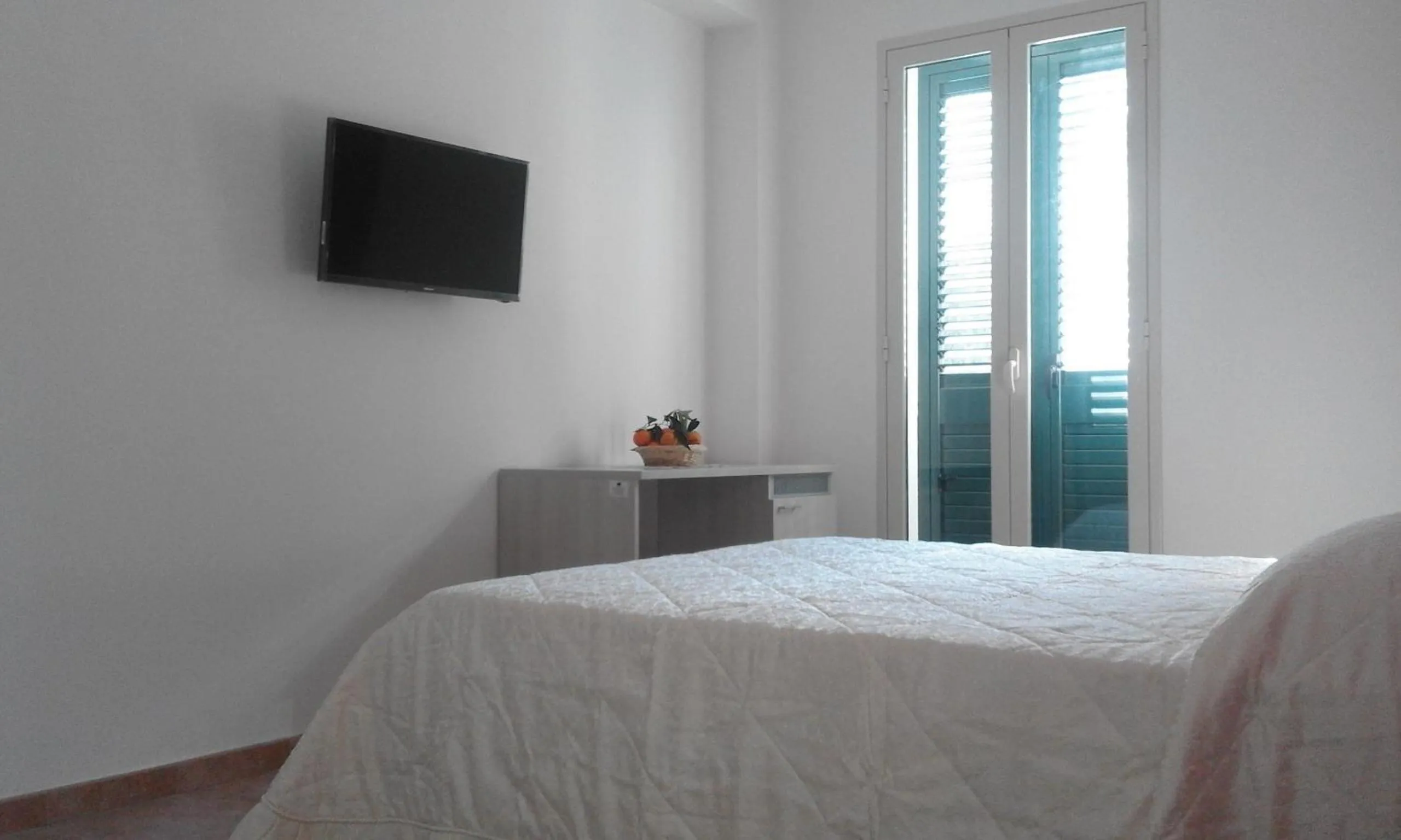 Bed in Modica Garden Resort