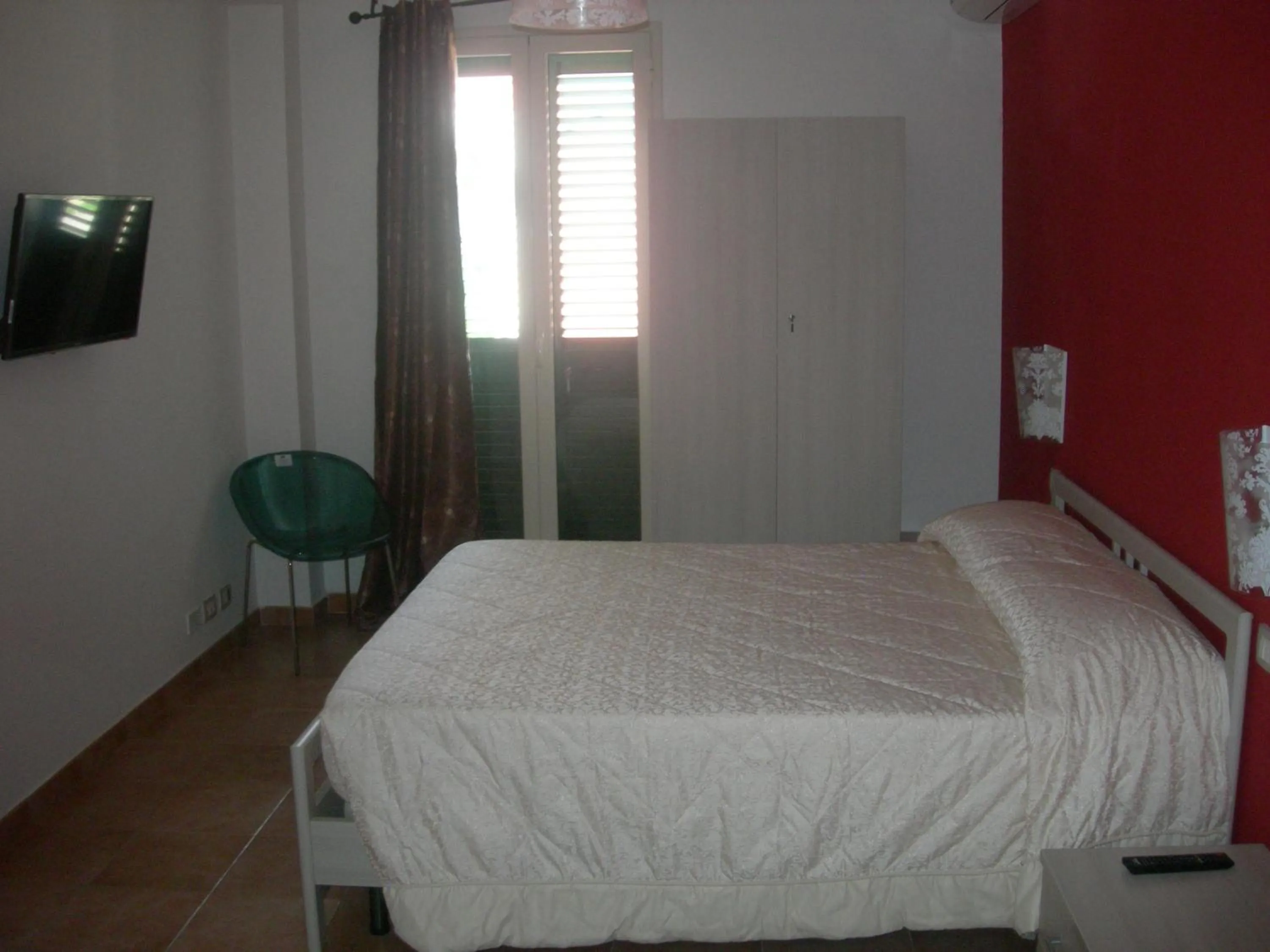 Bed in Modica Garden Resort