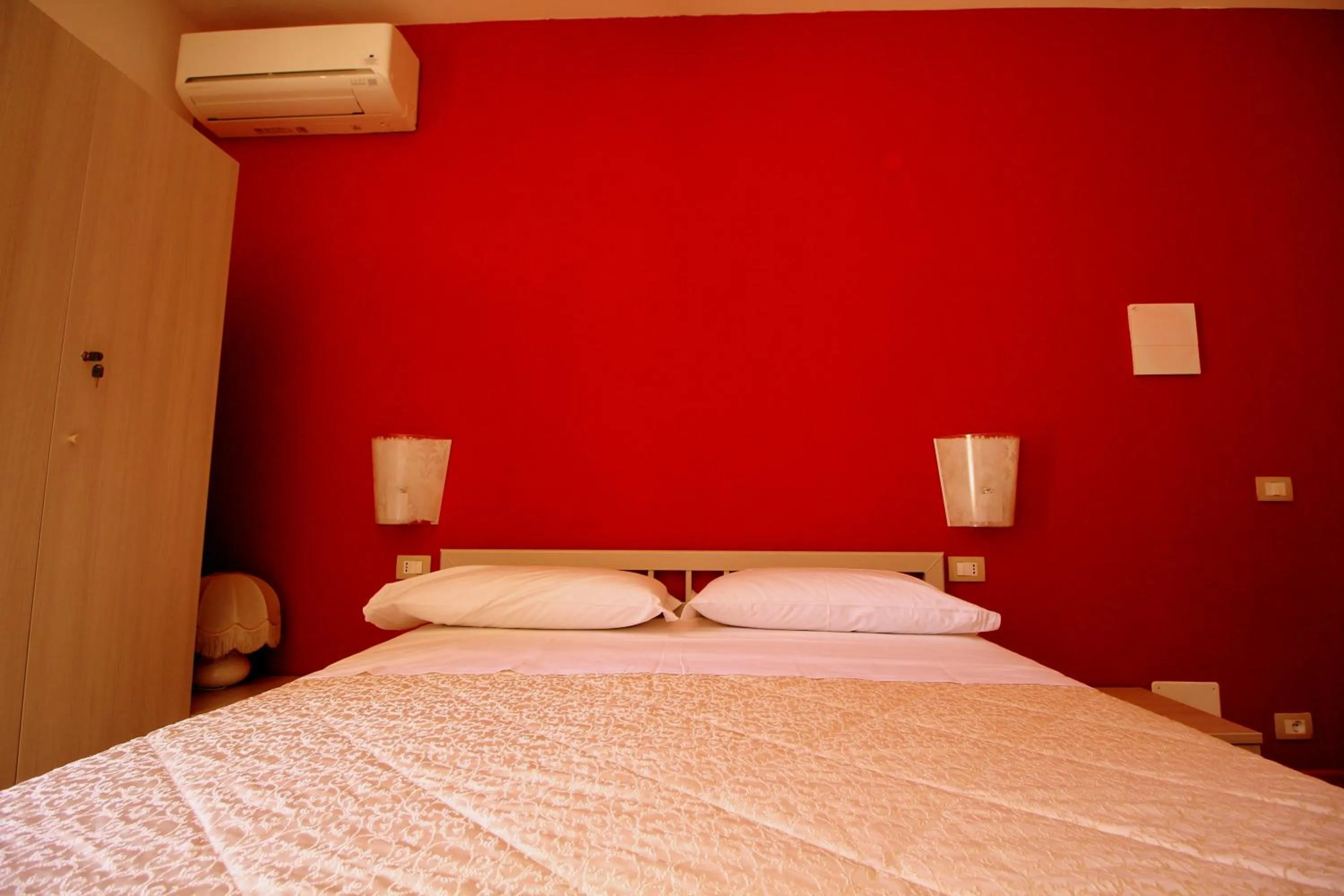 Bed in Modica Garden Resort