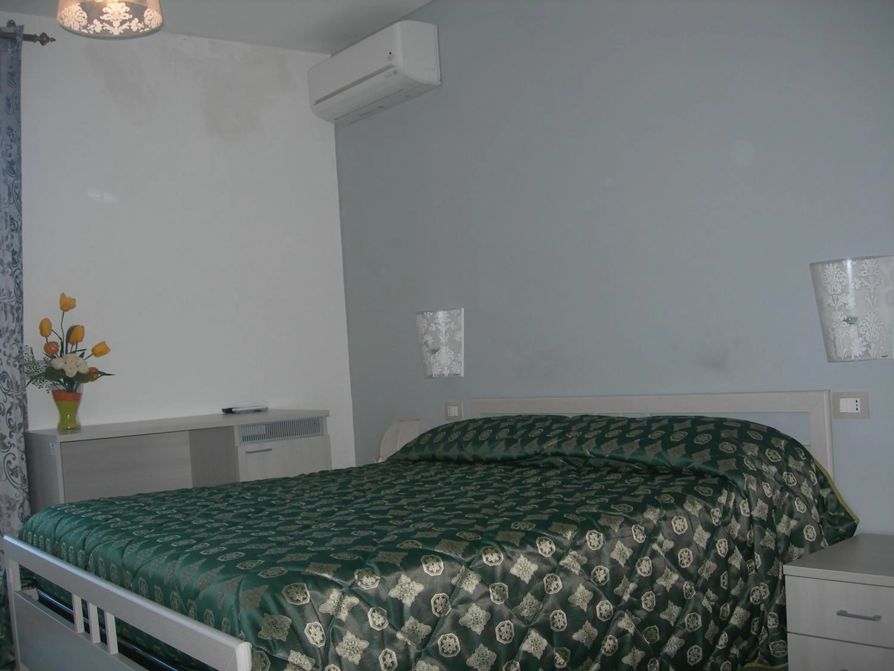 Bed in Modica Garden Resort