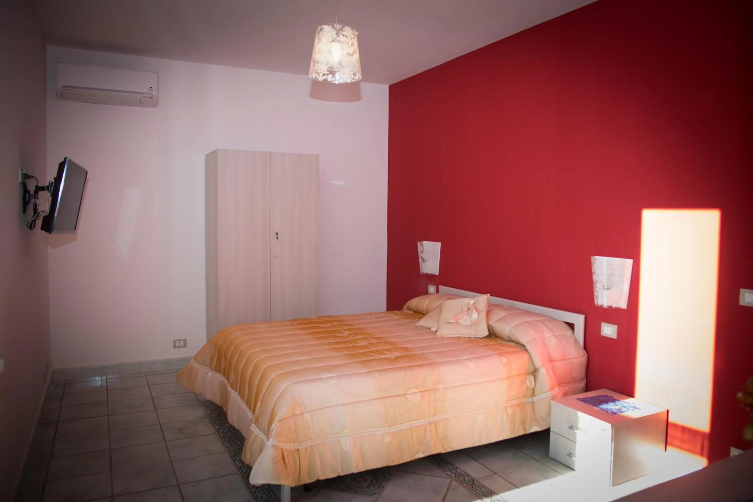 Bed in Modica Garden Resort