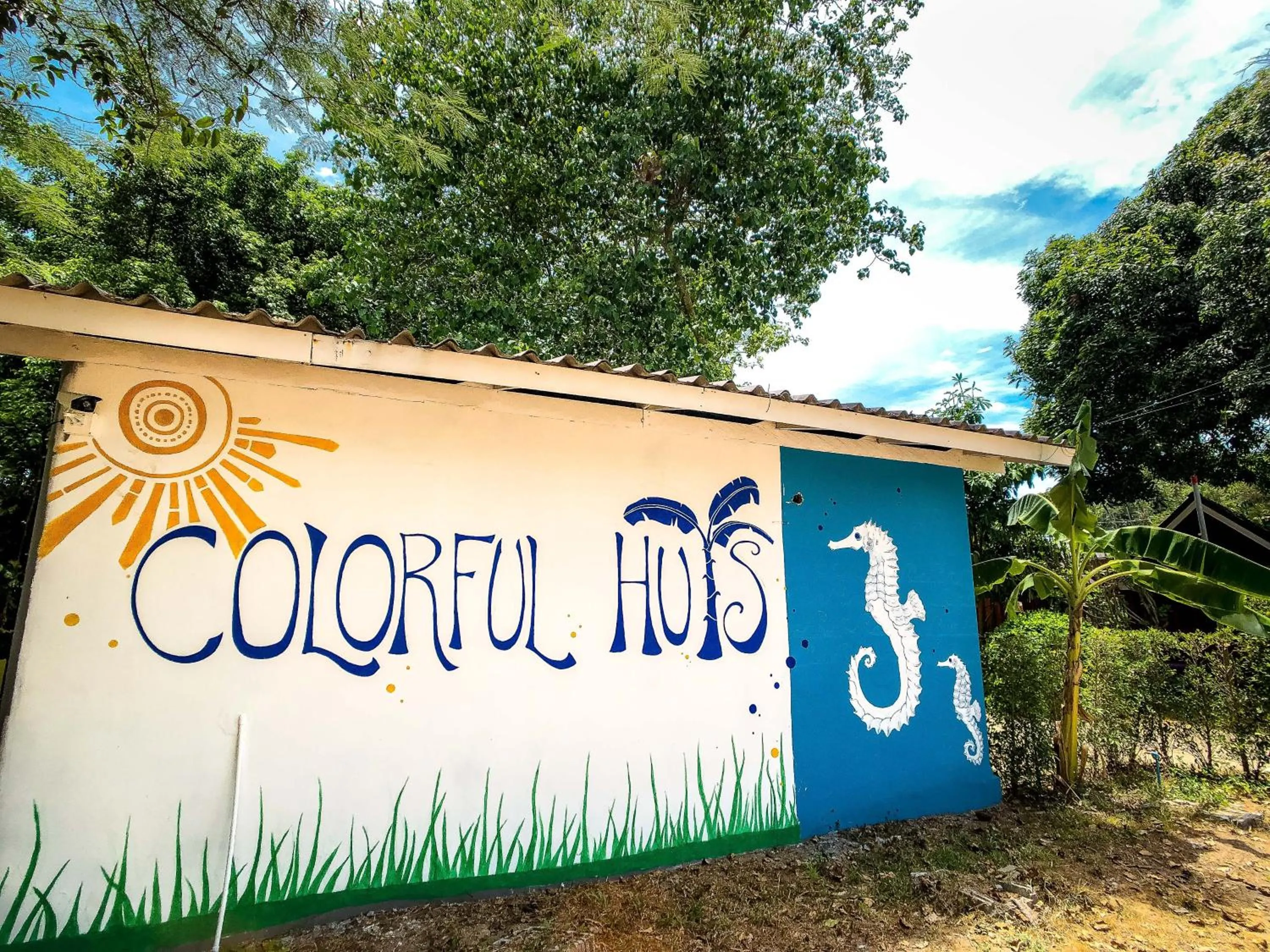 Property logo or sign in Colorful Hut