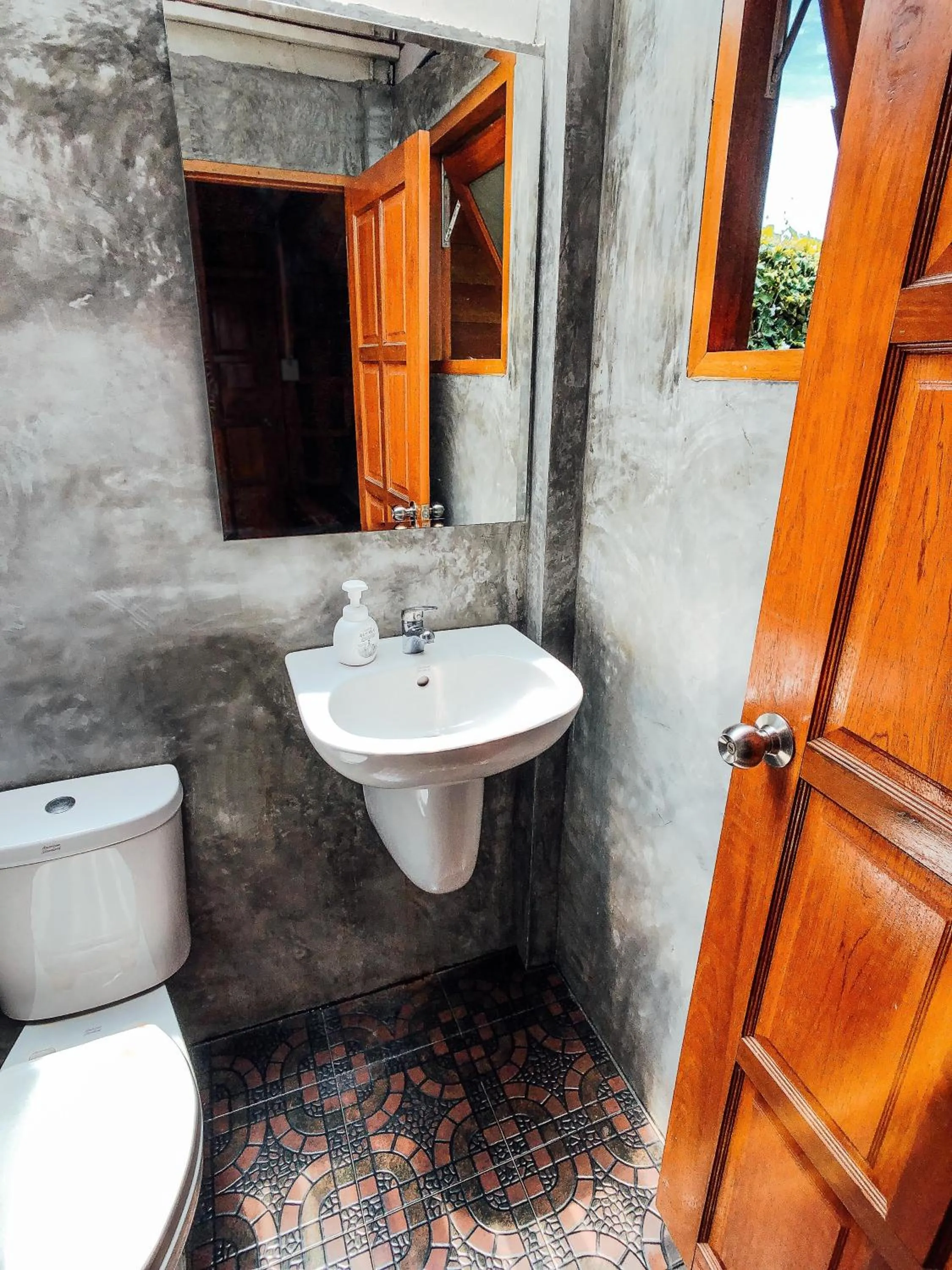 Toilet in Colorful Hut