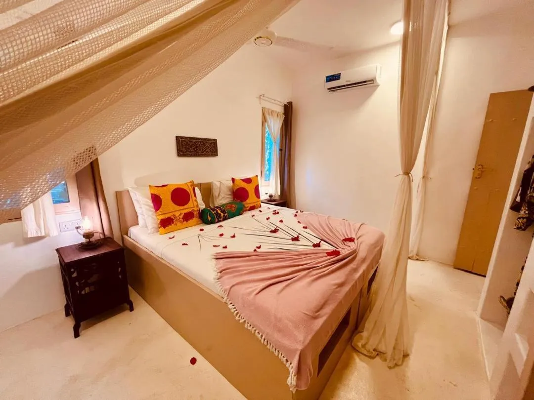 Bed in Sharazad Boutique Hotel