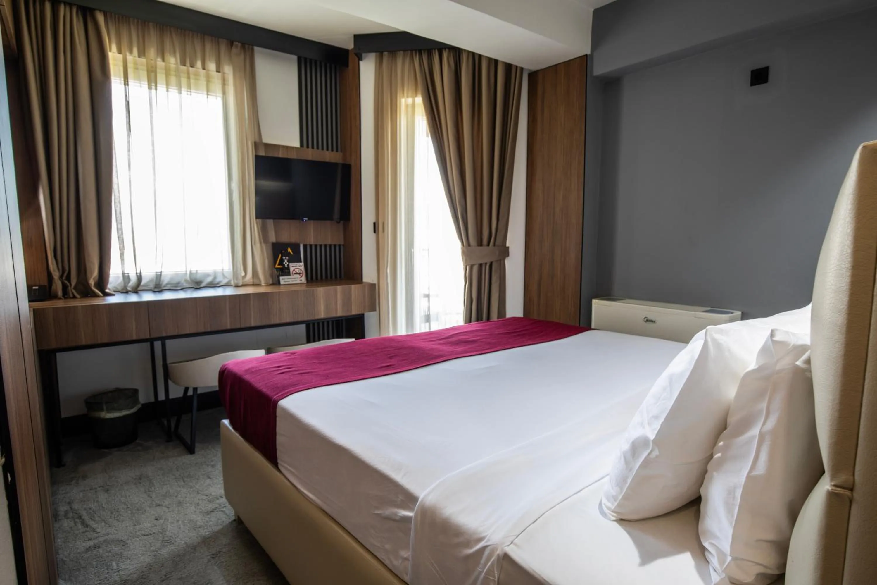 Bed in View Inn Boutique Hotel