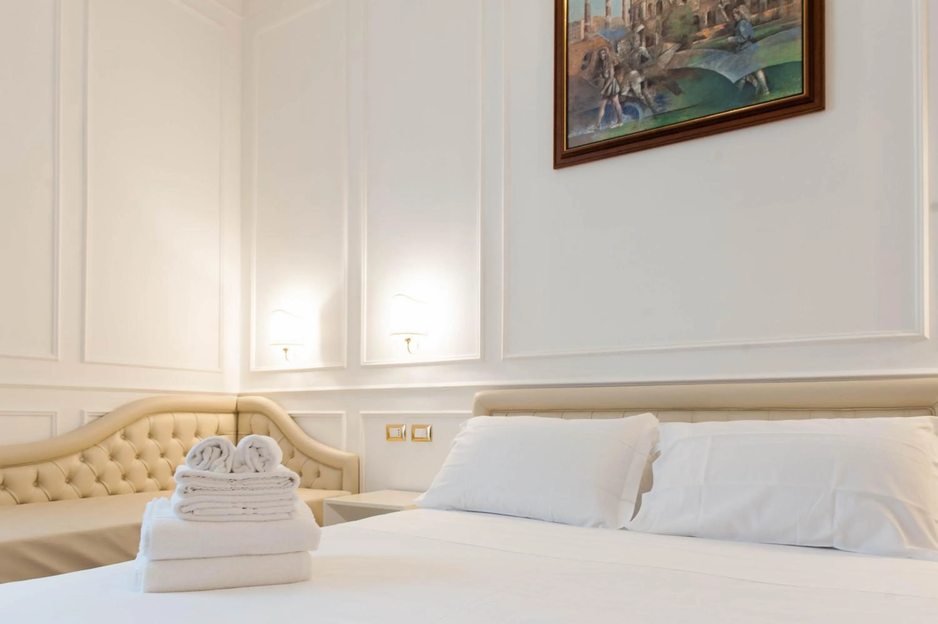 Bed in Navona Central Suites