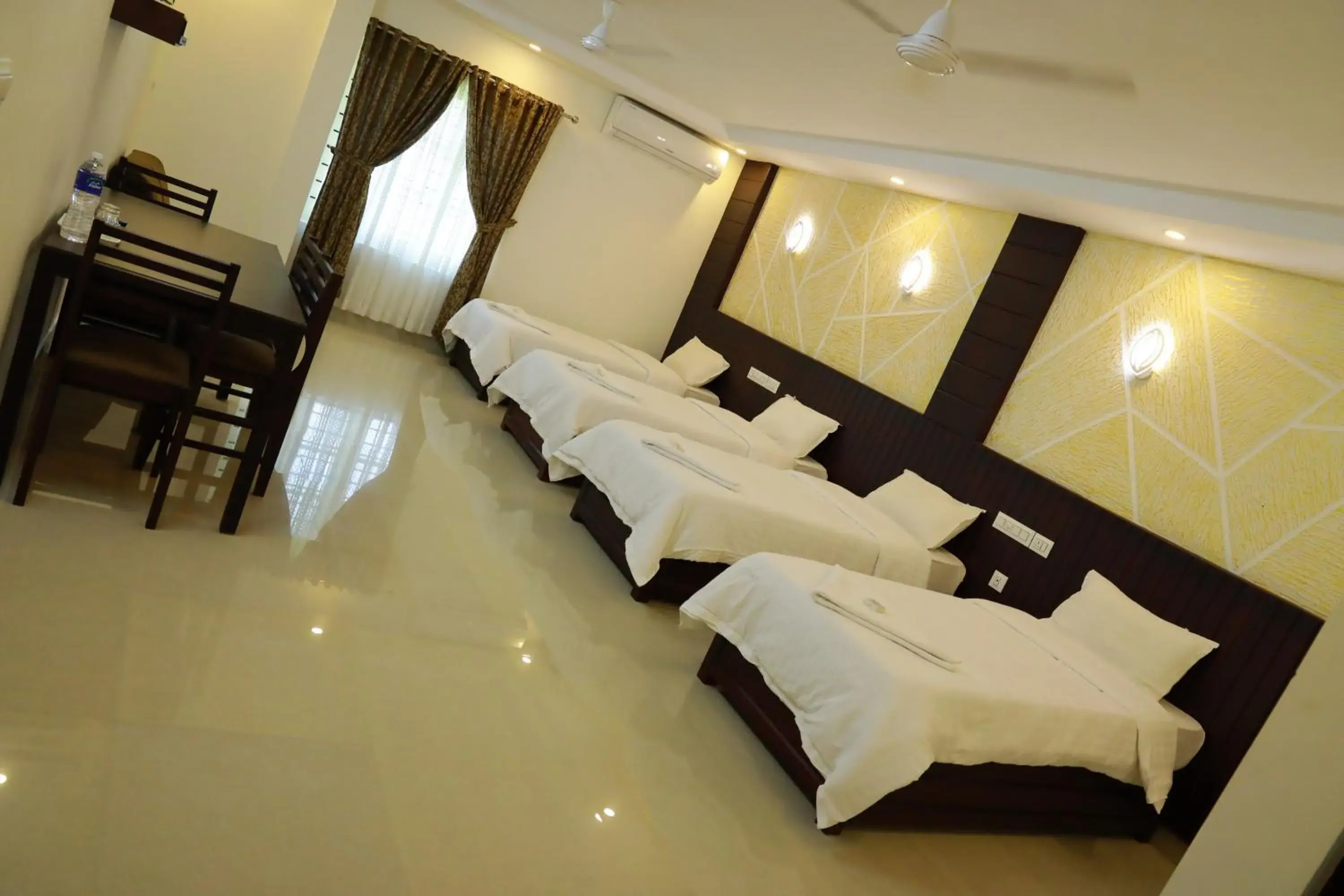 Deluxe Quadruple Room in Anna Residency Deluxe Quadruple Room in Anna Residency