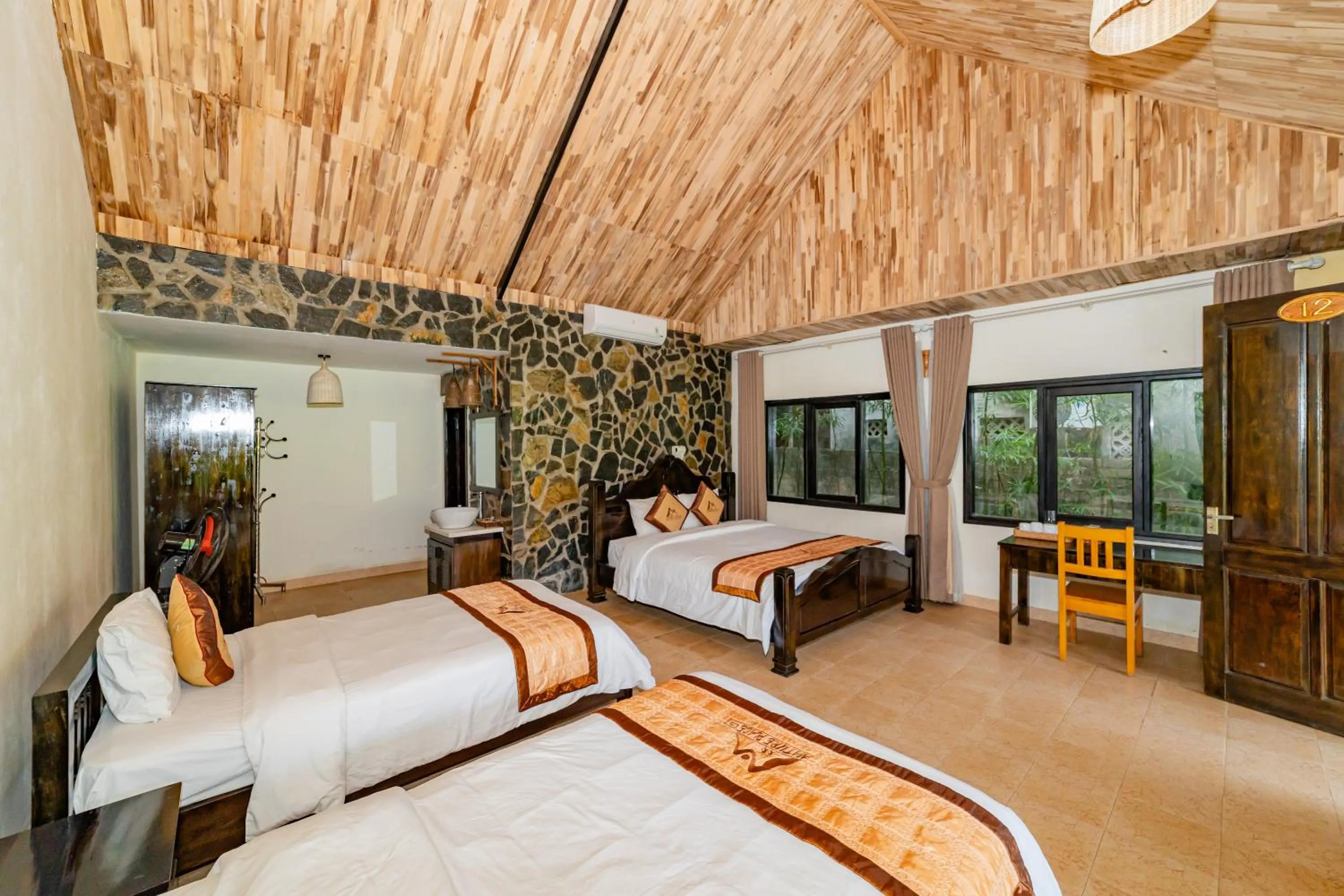 Photo of the whole room, Bed in Mai Chau Sunrise Village