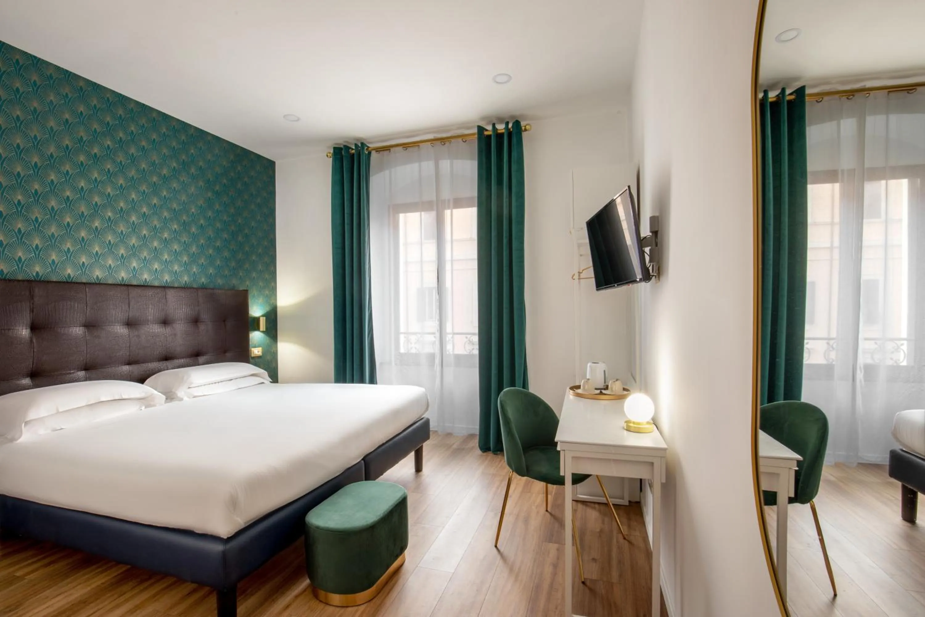 Bed in Amalia Suites by Remember Rome