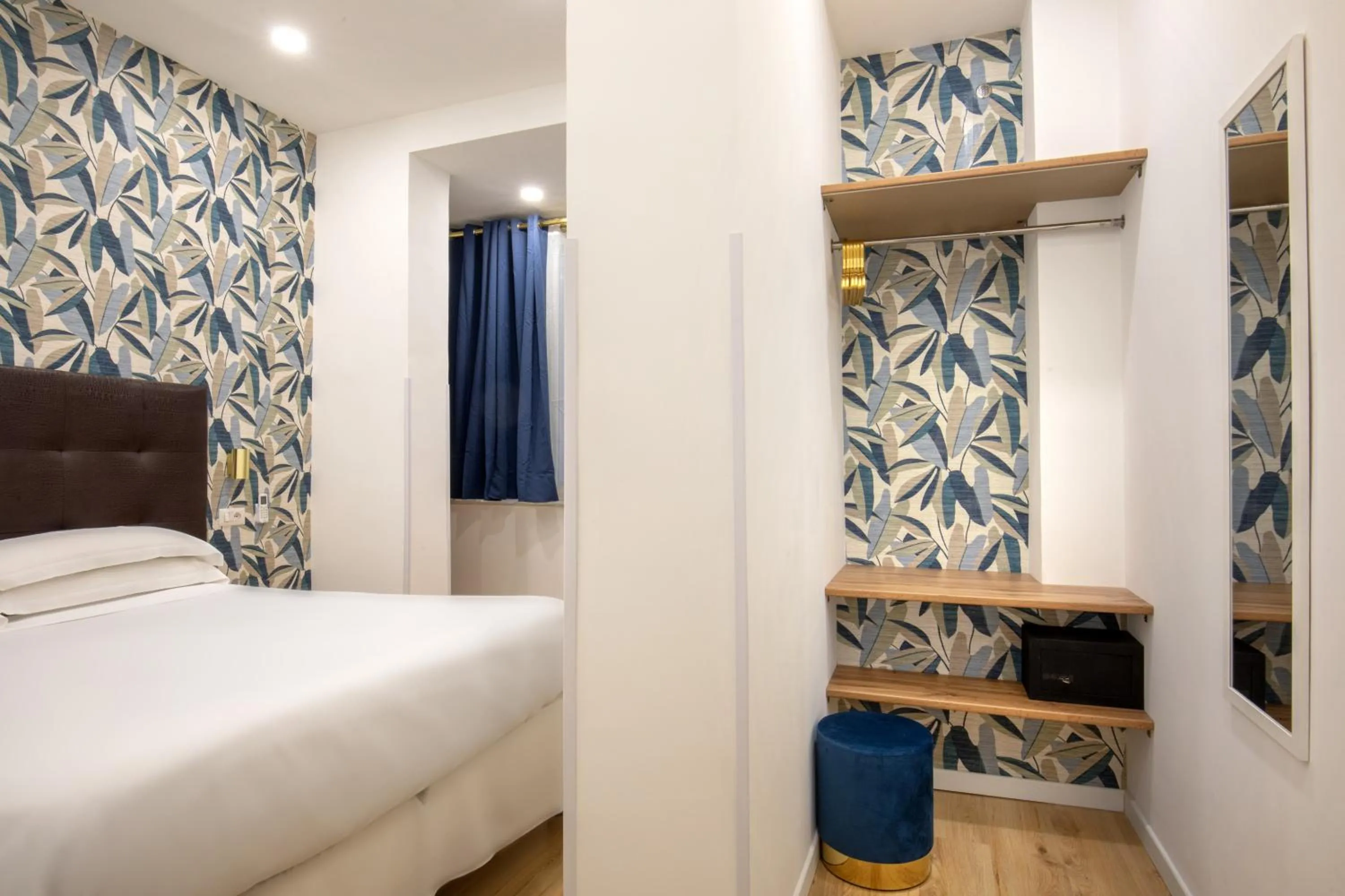 Bed in Amalia Suites by Remember Rome