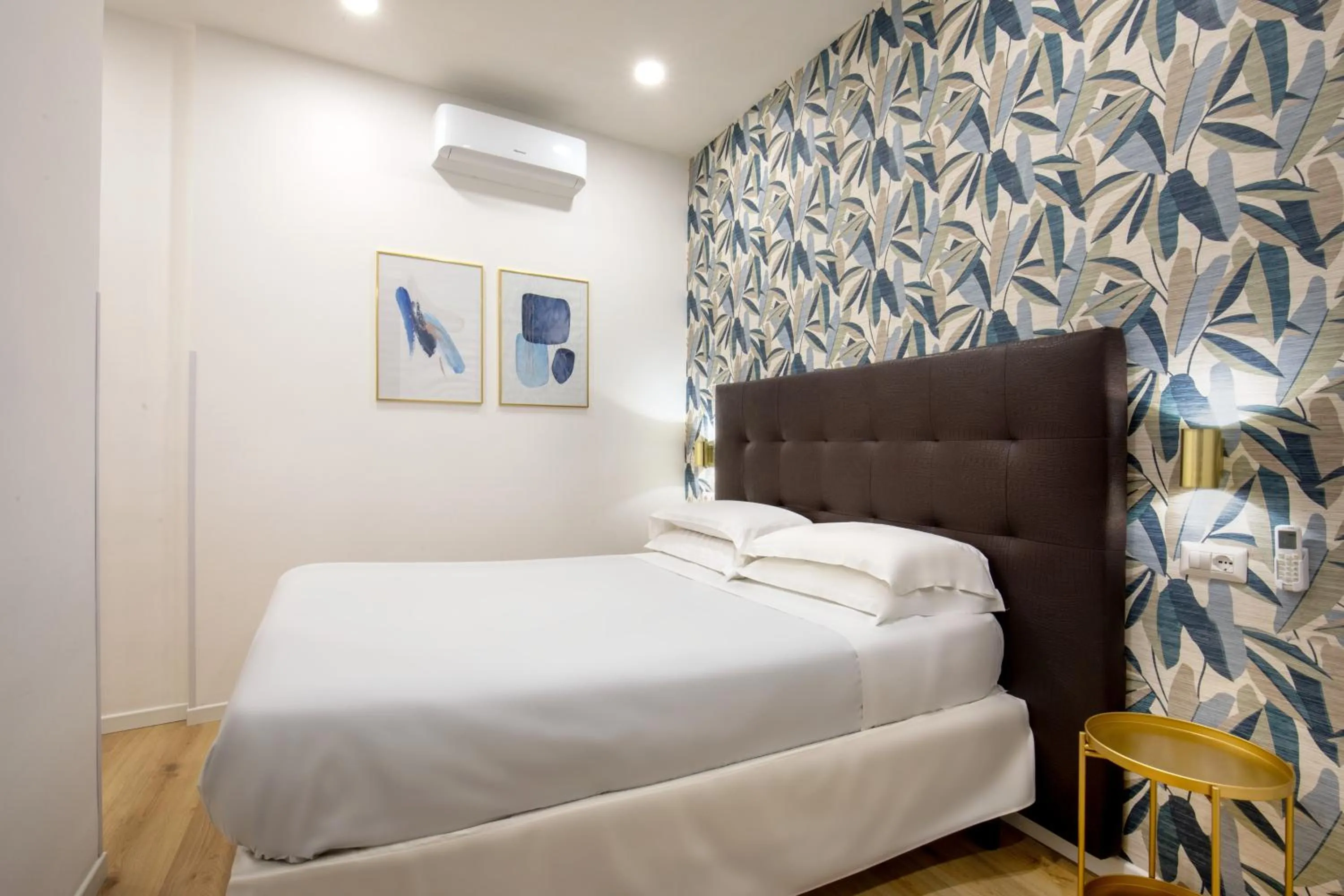 Bed in Amalia Suites by Remember Rome