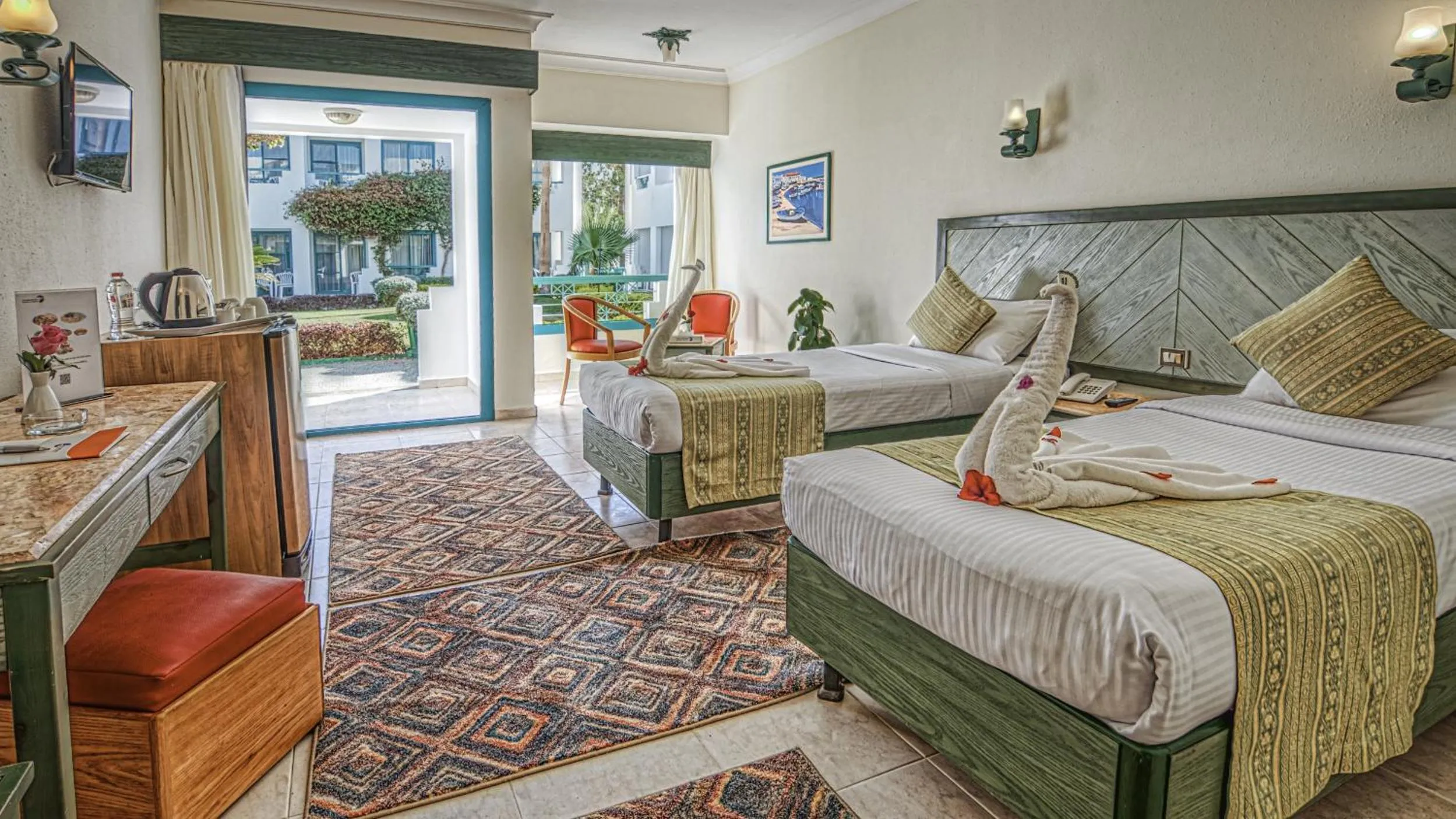 Seating area, Bed in Falcon Hills Hotel