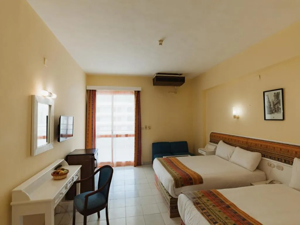 Bed in Empire Hotel Aqua Park