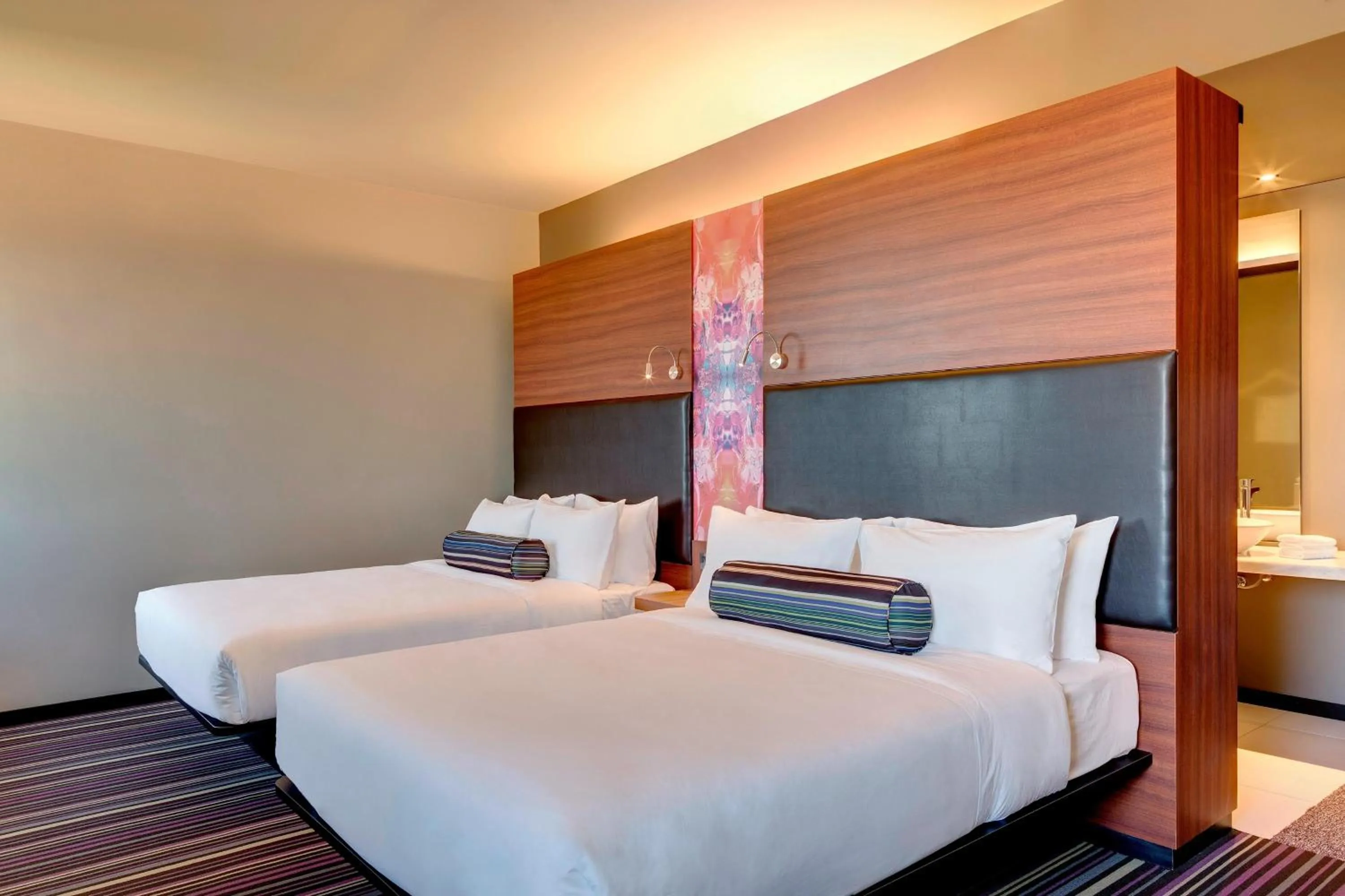Photo of the whole room, Bed in Aloft Asuncion