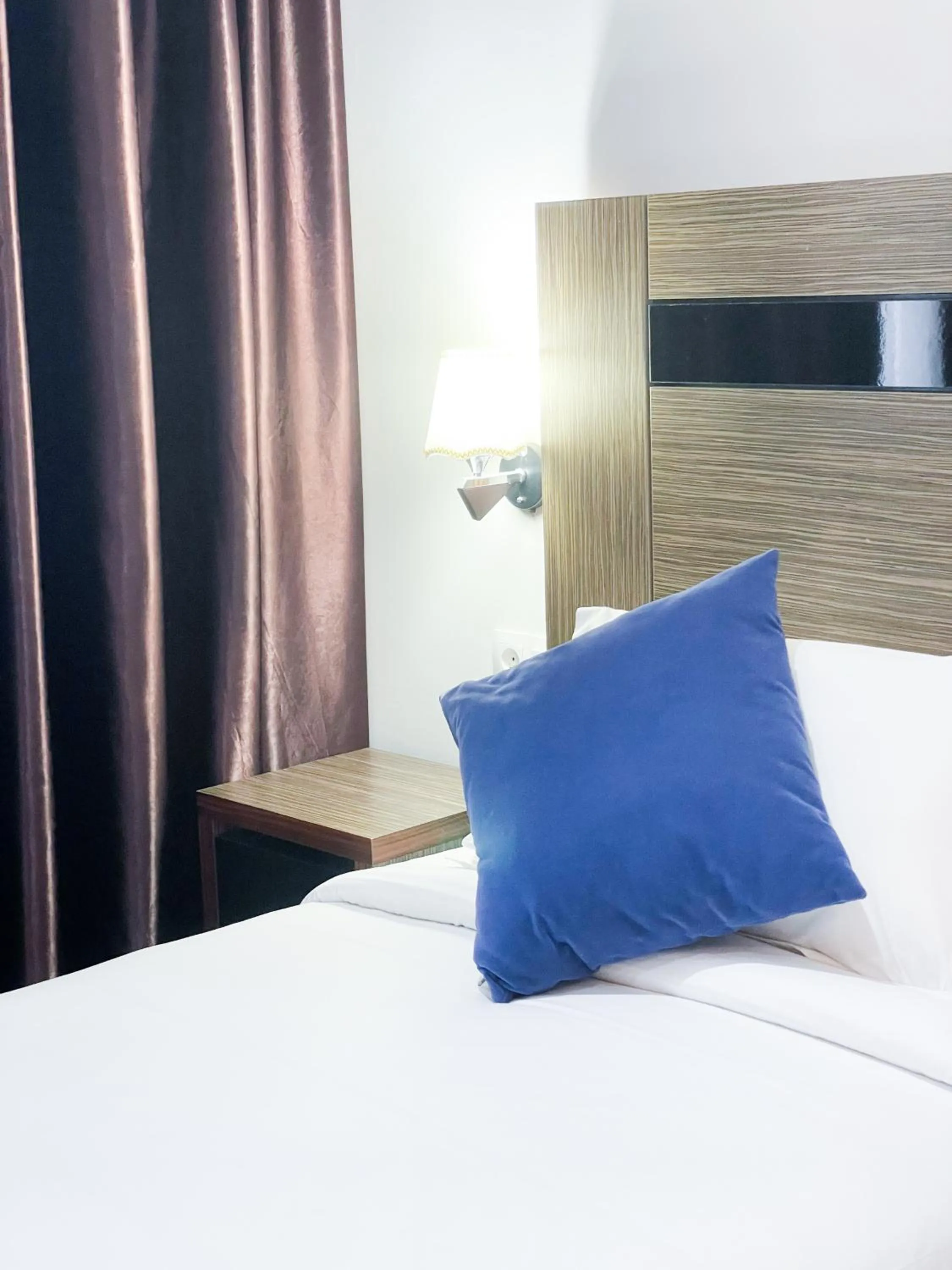 Bed in Tanger Med Hotel, Conference & Catering