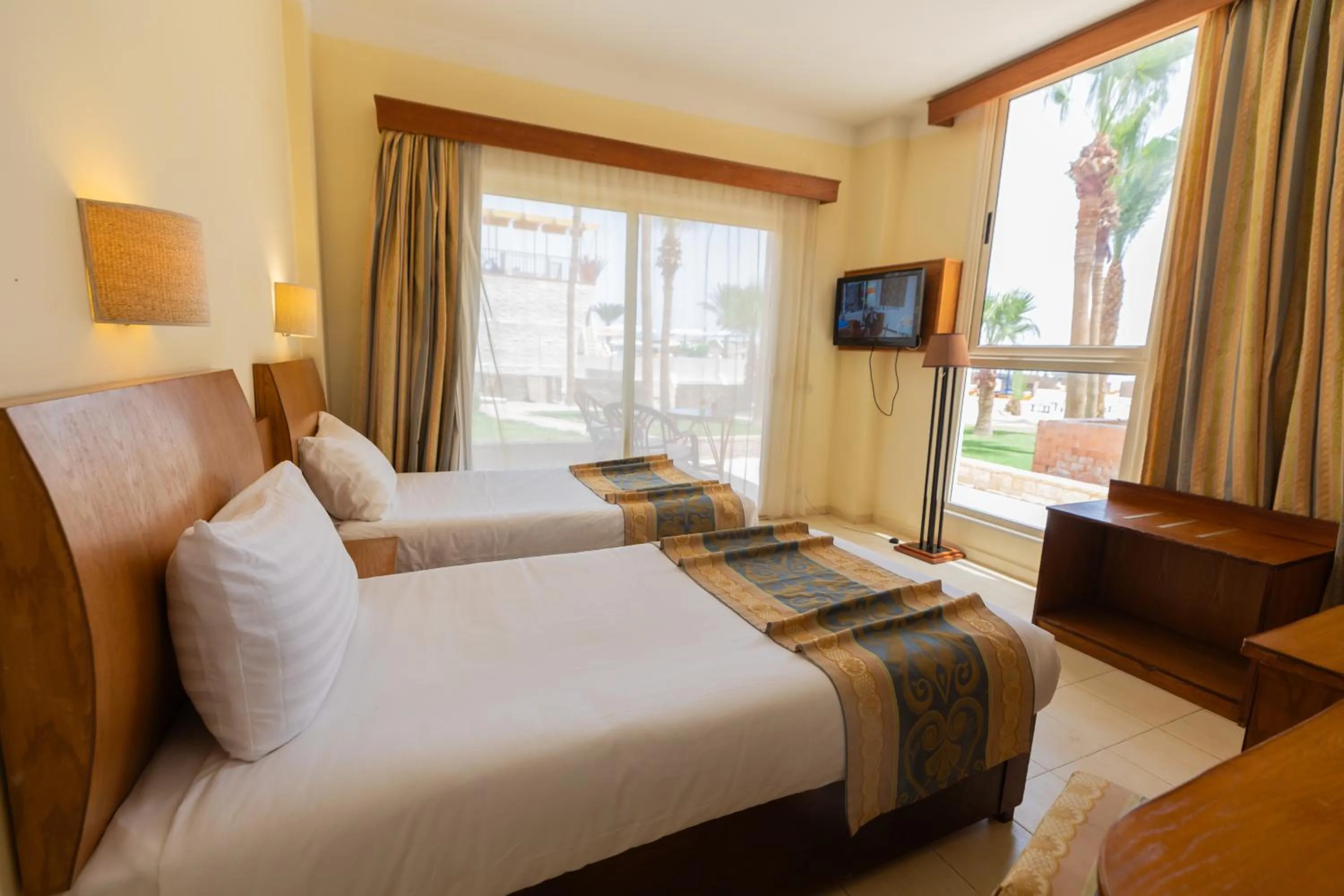 Bedroom, Bed in Empire Beach Aqua Park