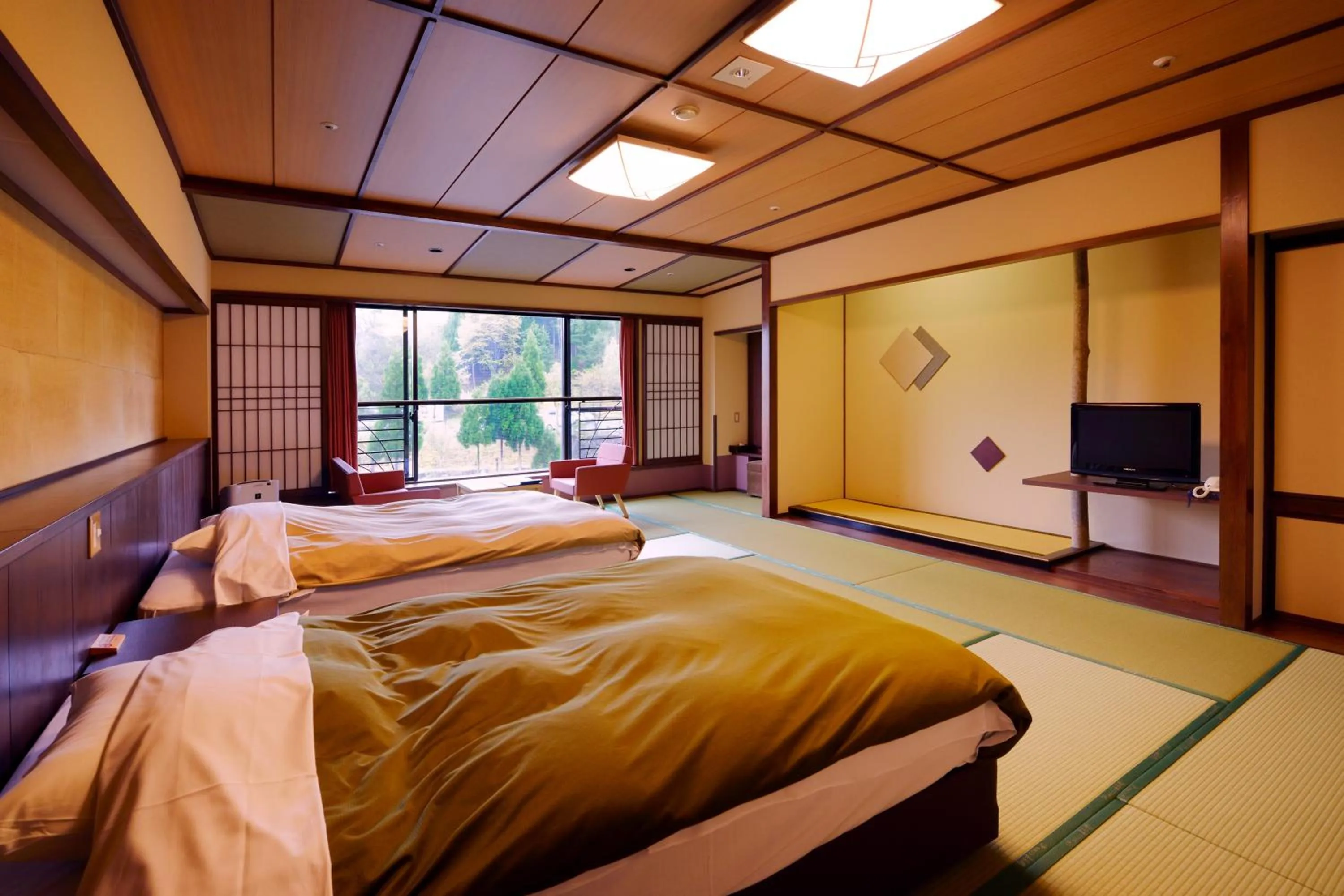 Photo of the whole room, Bed in Yunogo Onsen HOTEL YUNOMORI BISYUNKAKU