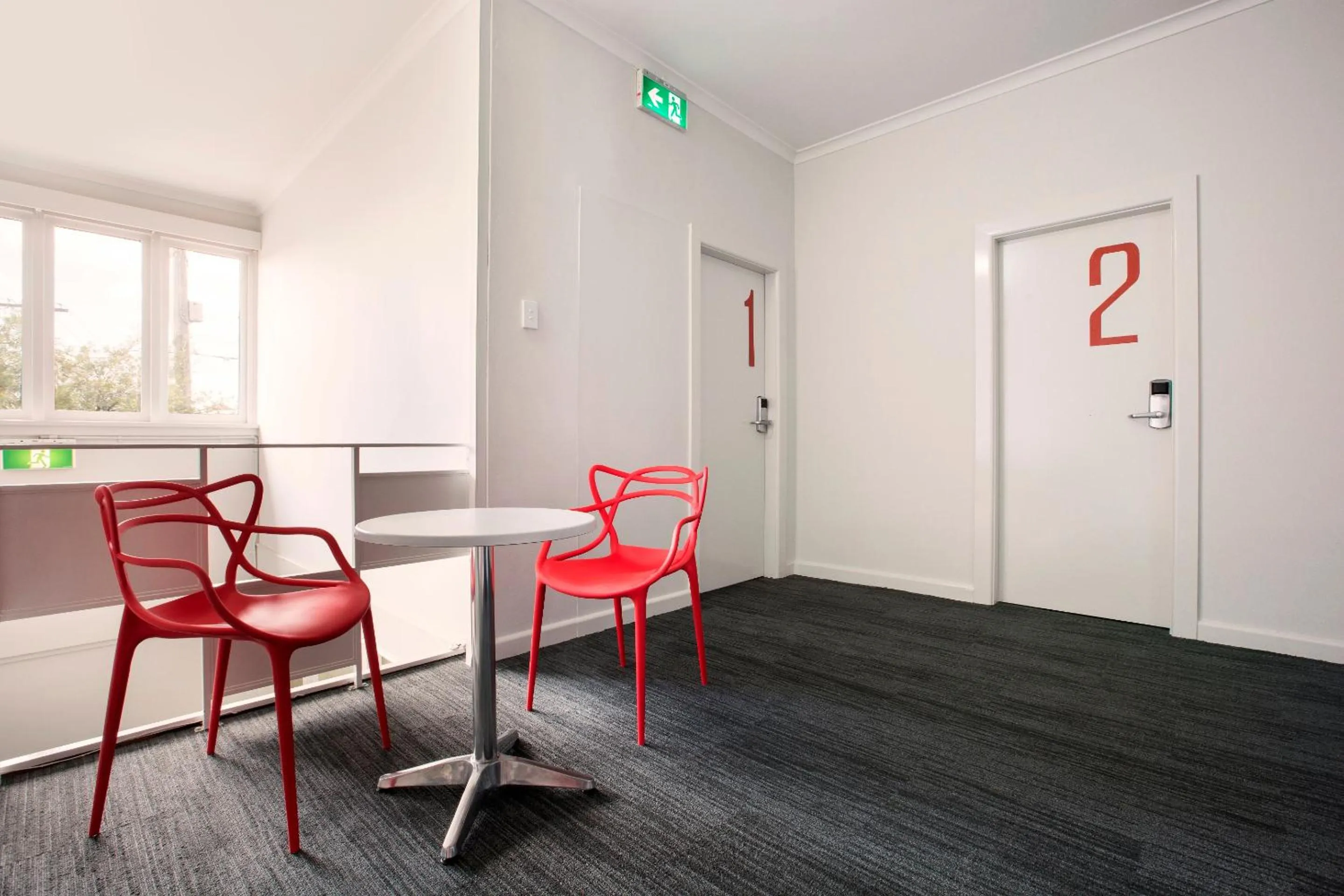 Communal lounge/ TV room in Greenacre Hotel