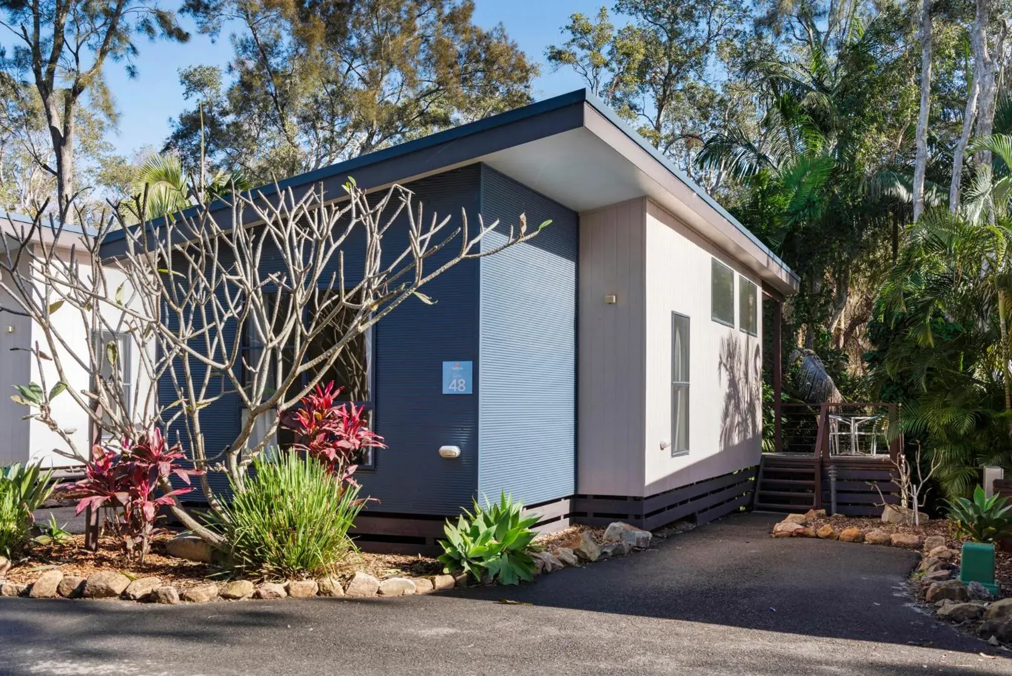 Deluxe 2 Bedroom Cabin - Sleeps 6 (1 Queen, 1 Double, 1 Bunk) in Discovery Parks - Emerald Beach Deluxe 2 Bedroom Cabin - Sleeps 6 (1 Queen, 1 Double, 1 Bunk) in Discovery Parks - Emerald Beach