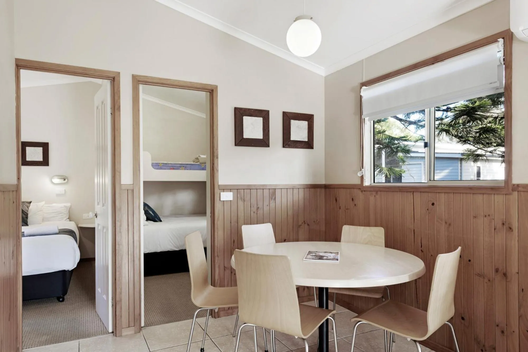Dining area, Bed in Discovery Parks - Emerald Beach