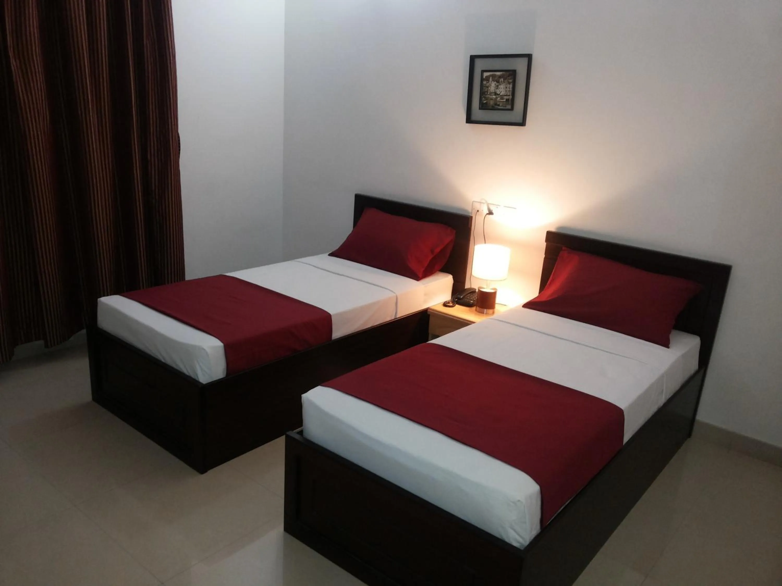 Bed in Azaiba Hotel Apartments