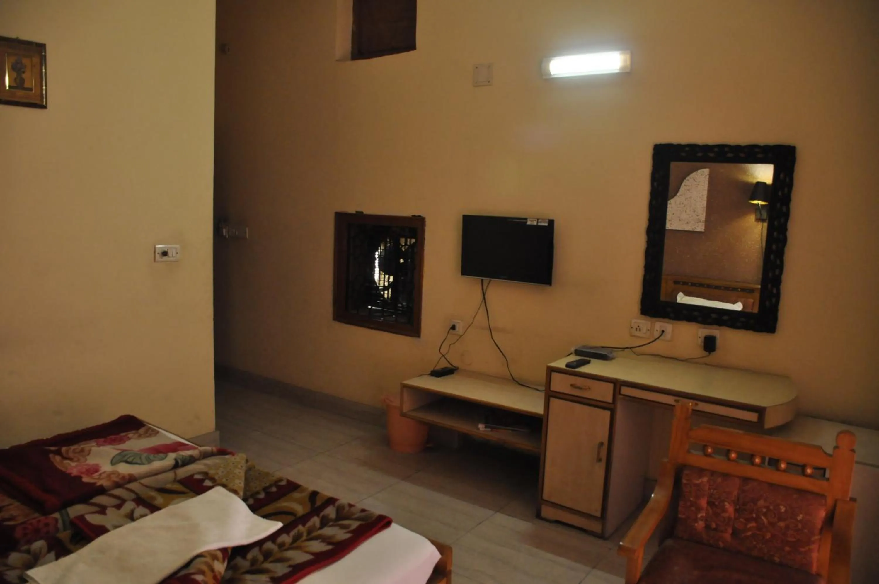 Bed in Hotel Pratiksha