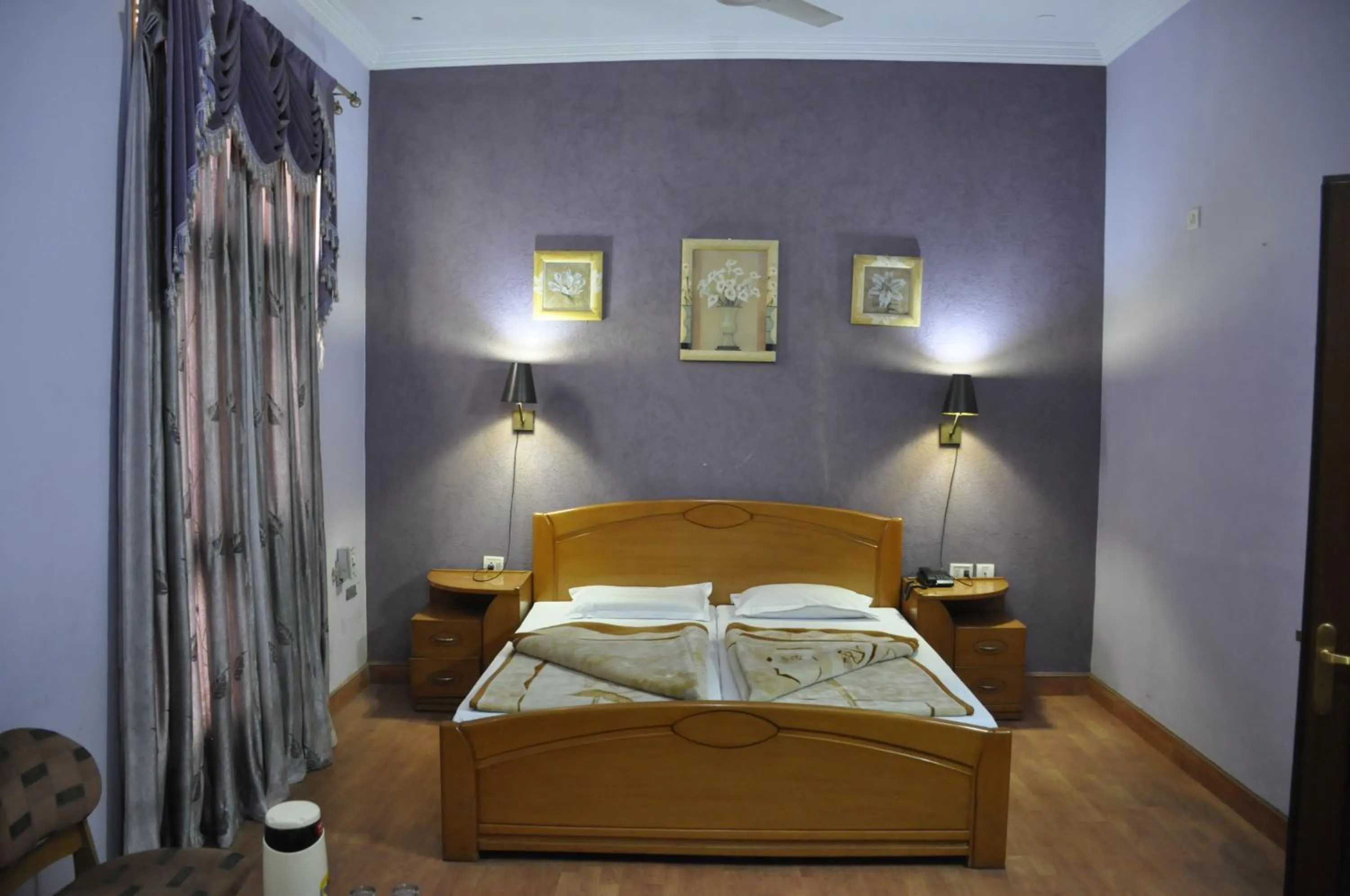 Bed in Hotel Pratiksha